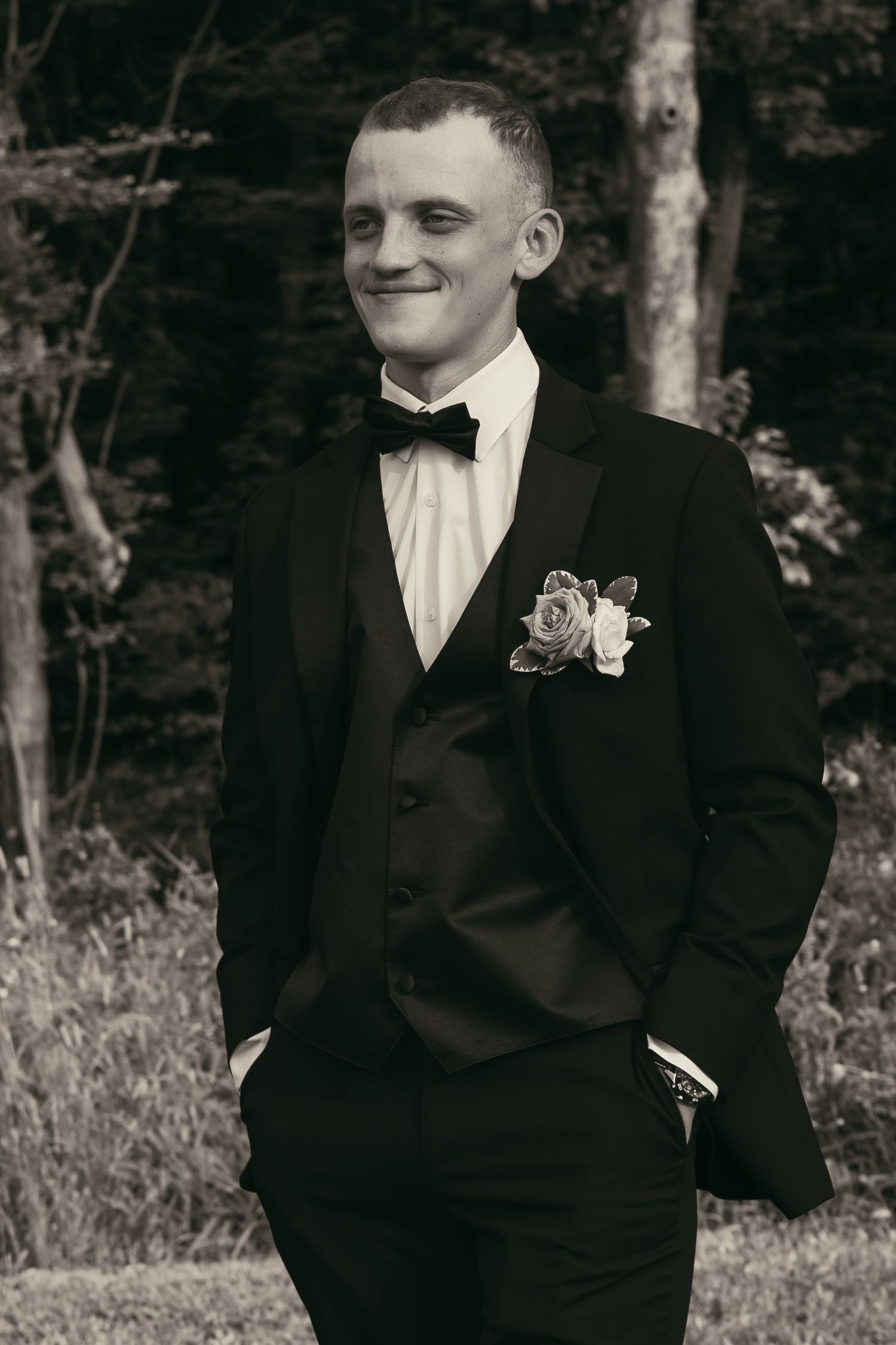 Black and white groom in tux in Cleveland Ohio by Gypsy Lens Photography. Moody, vintage, documentary wedding photographer.
