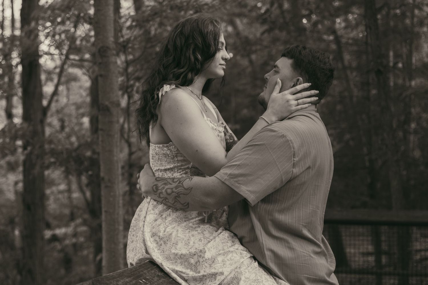 Couple sharing moment in Lake County Ohio by Gypsy Lens Photography. Moody, filmy, vintage, documentary wedding photography.