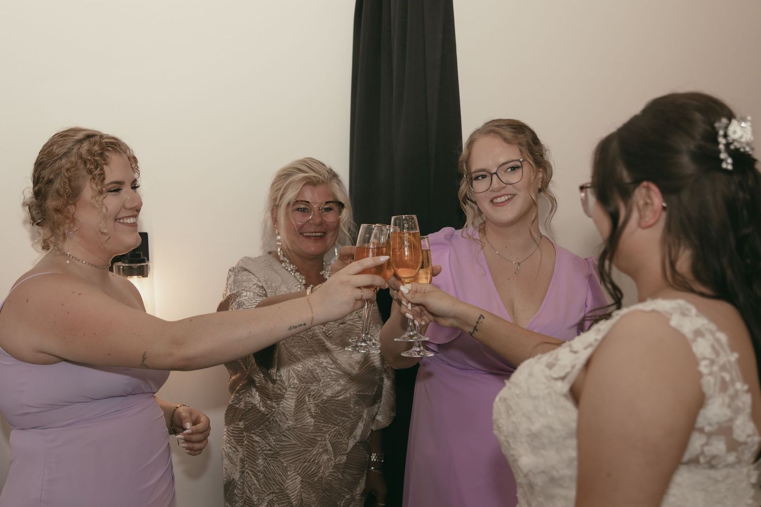 Bride and mom toasting in Cleveland Ohio by Gypsy Lens Photography. Moody, vintage, documentary wedding photographer.