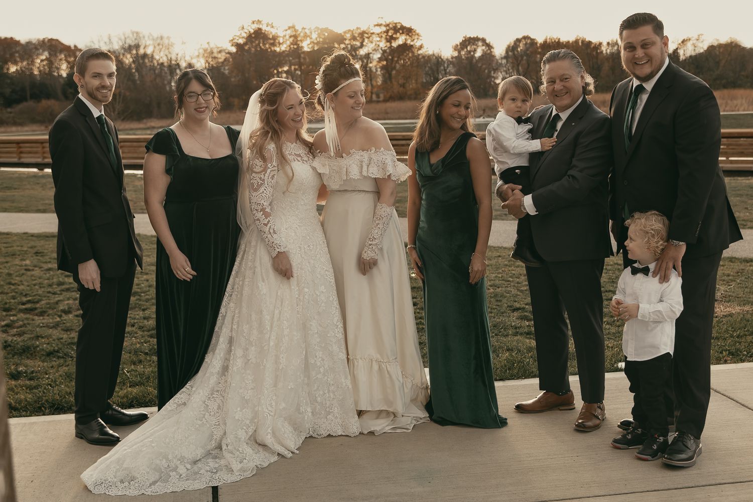 Cinematic sunset family portraits at wedding in Lake County Ohio by Gypsy Lens Photography. Moody, vintage, documentary wedding photography.