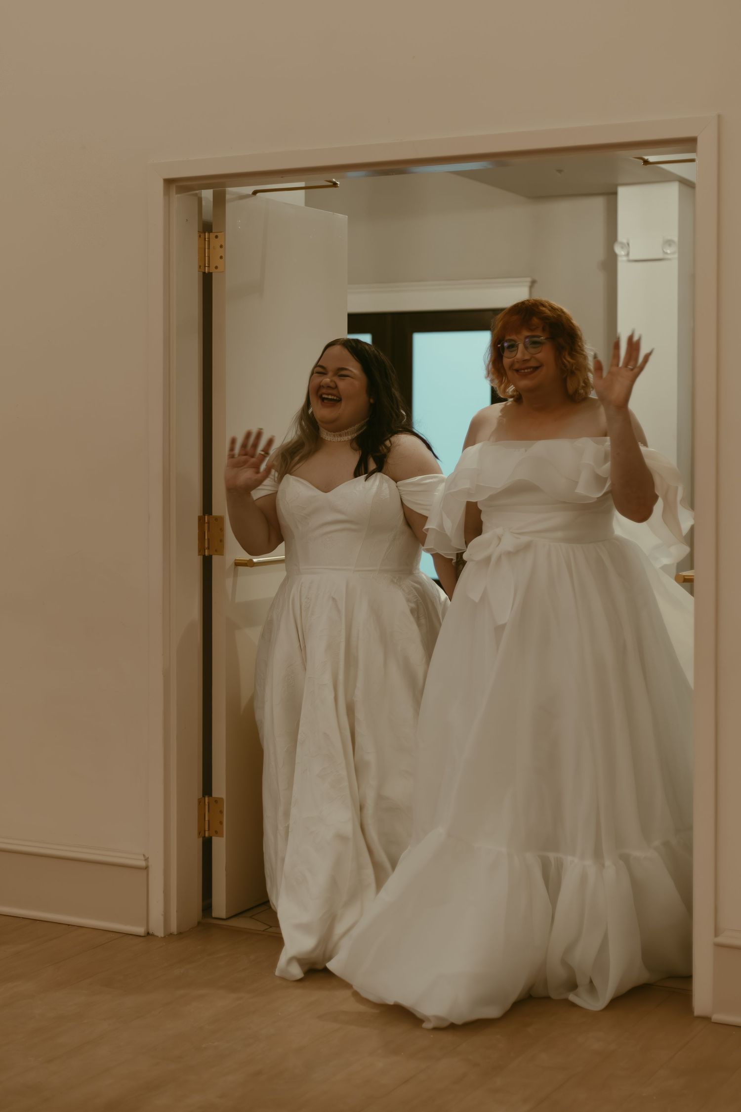 Two brides grand entrance to reception in Cleveland Ohio by Gypsy Lens Photography. Moody, filmy, vintage, documentary wedding photography.