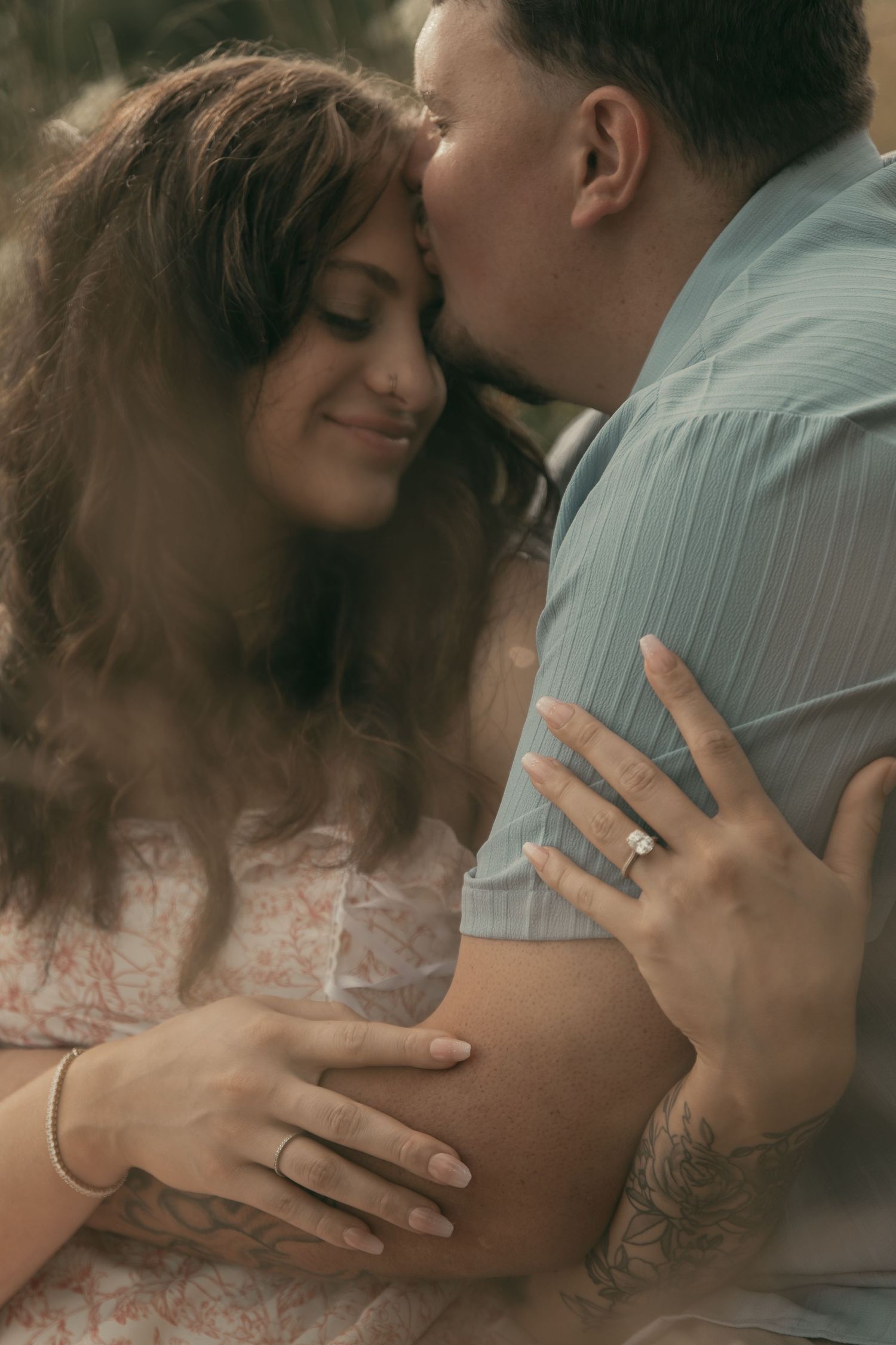 Couple sharing a moment at engagement session in Lake County Ohio by Gypsy Lens Photography, moody vintage documentary wedding photography