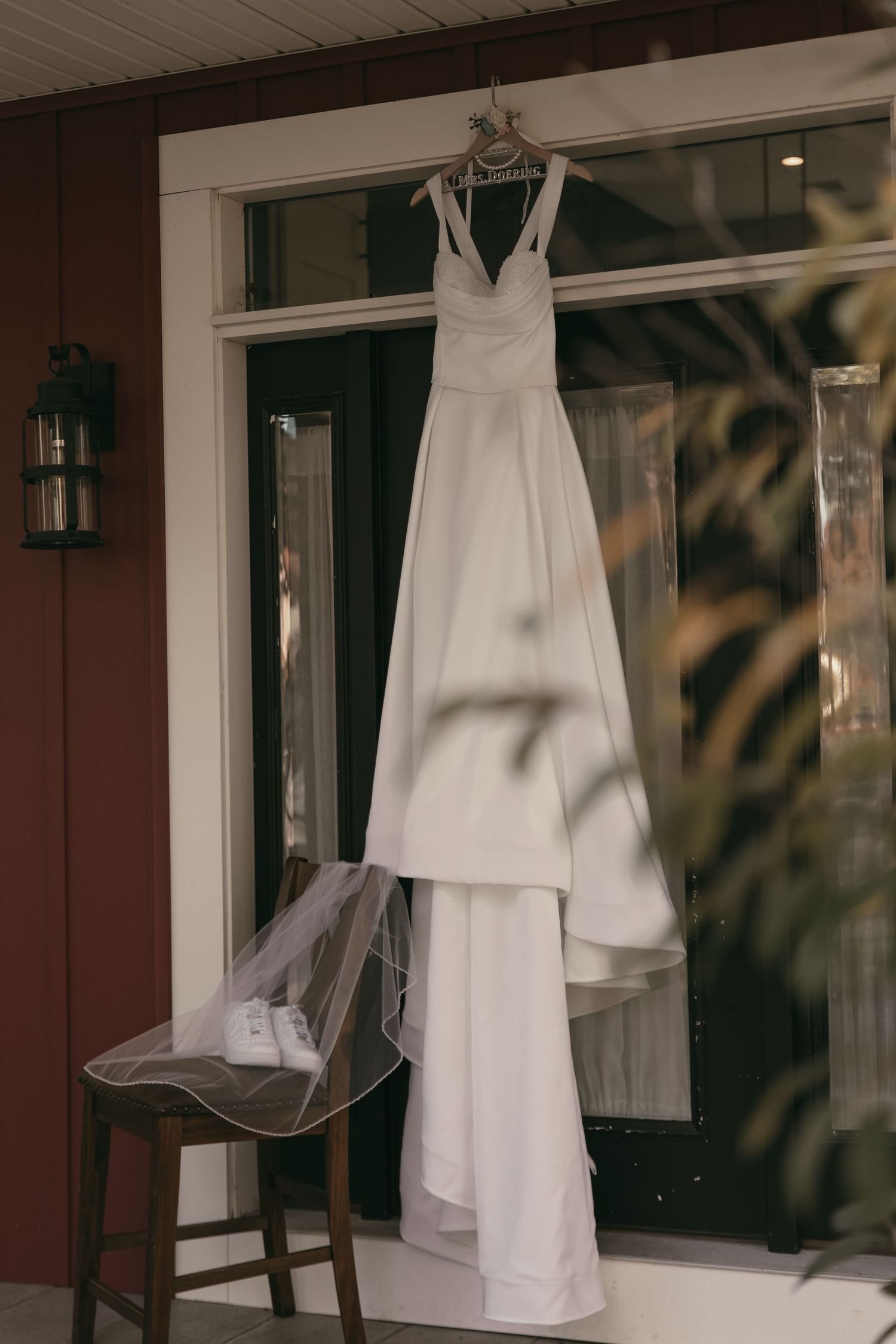 Dress detail on wedding day in Cleveland Ohio by Gypsy Lens Photography. Moody, vintage, documentary wedding photography.