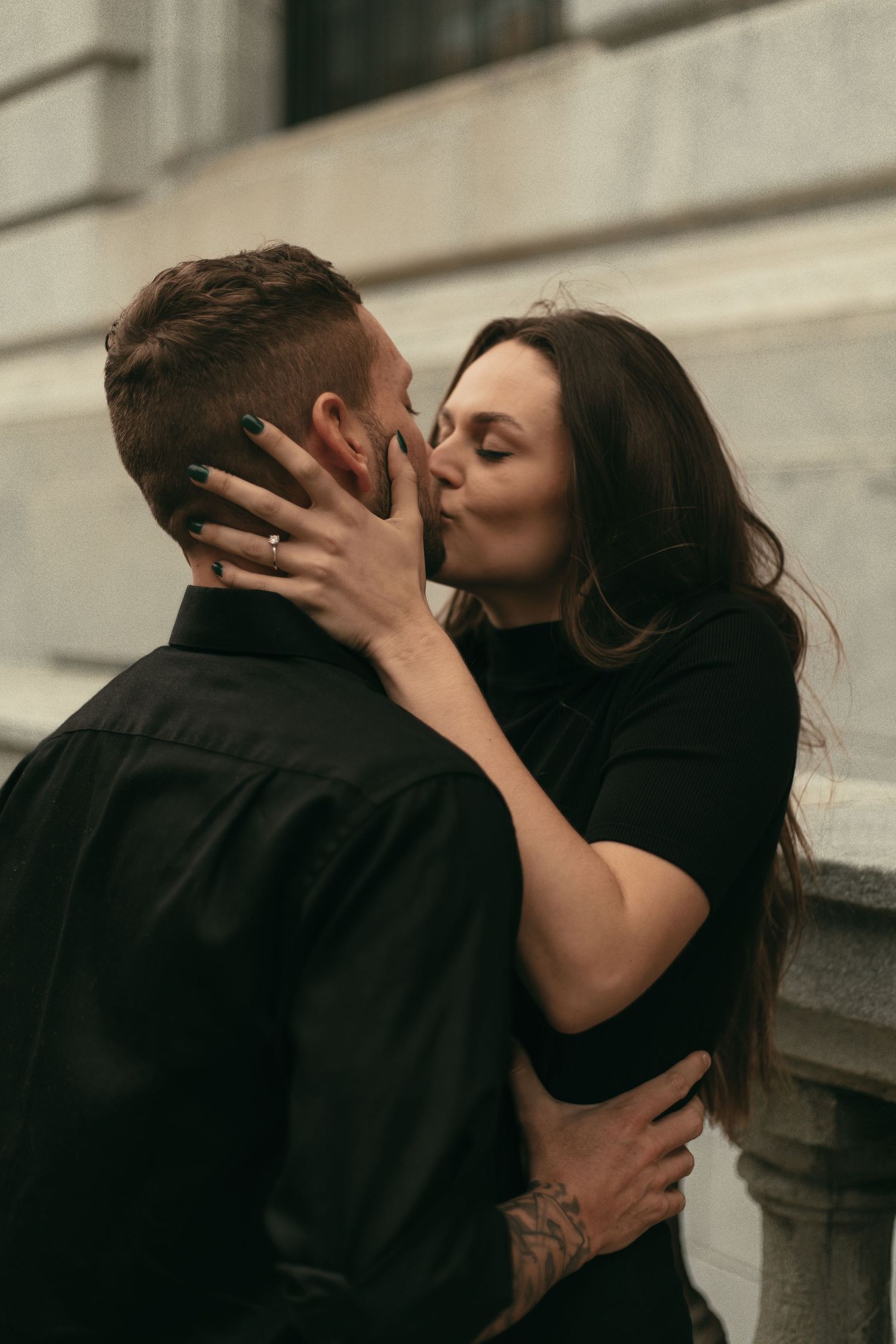 Couple kissing in big city of Cleveland Ohio by Gypsy Lens Photography. Moody, nostalgic, vintage, documentary wedding photography