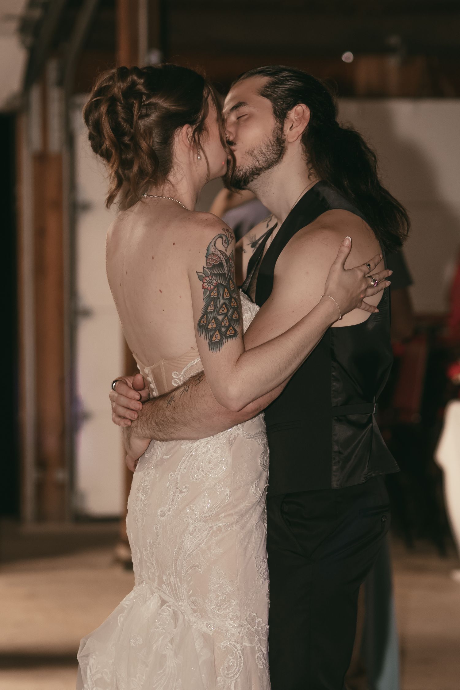 Newlyweds dancing at reception in Hermitage Pennsylvania by Gypsy Lens Photography. Moody, vintage, documentary wedding photo.