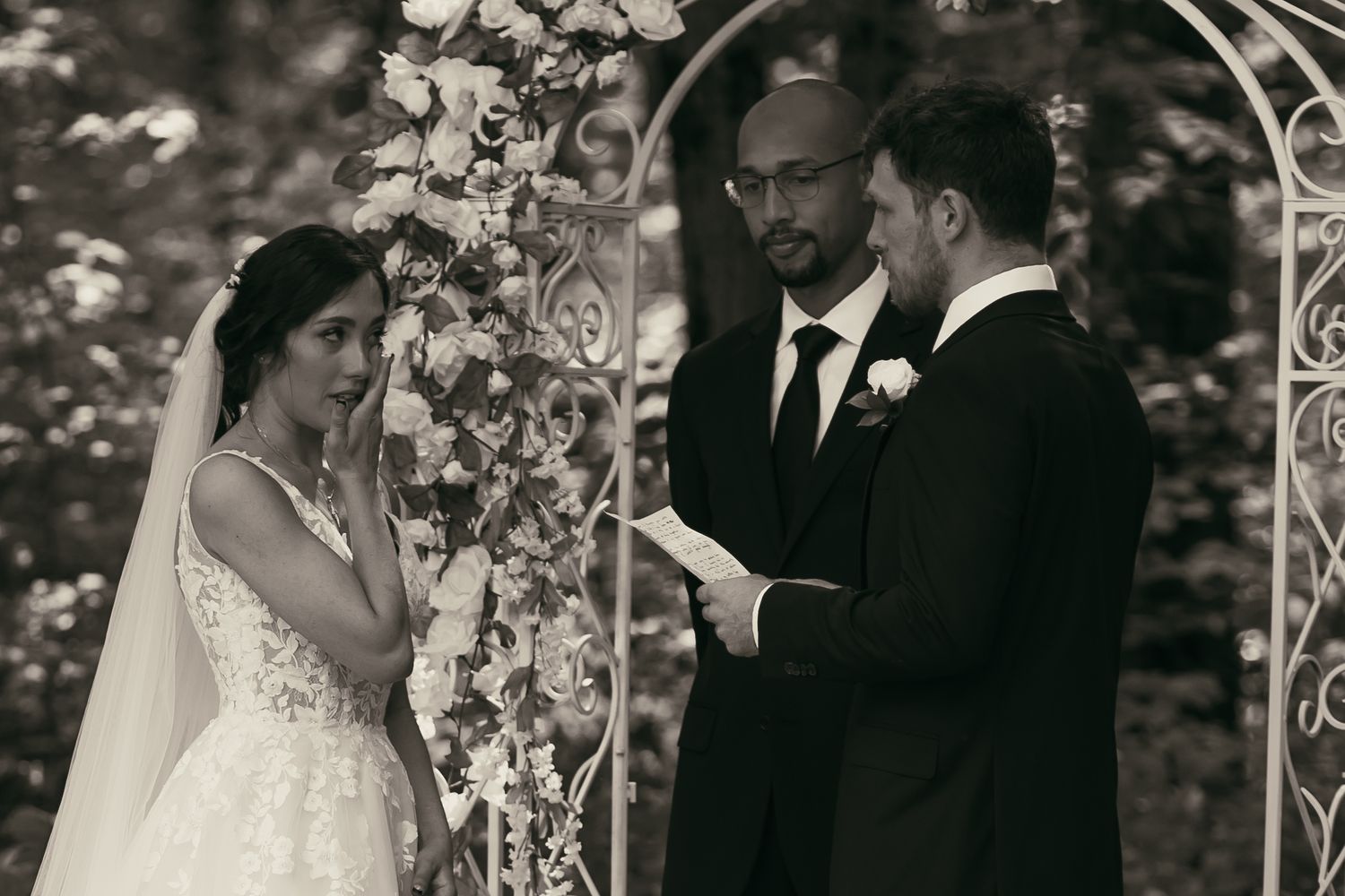 Newlyweds exchanging vows emotionally in Tallmadge Ohio by Gypsy Lens Photography. Moody, vintage, intimate, nostalgic, documentary wedding.