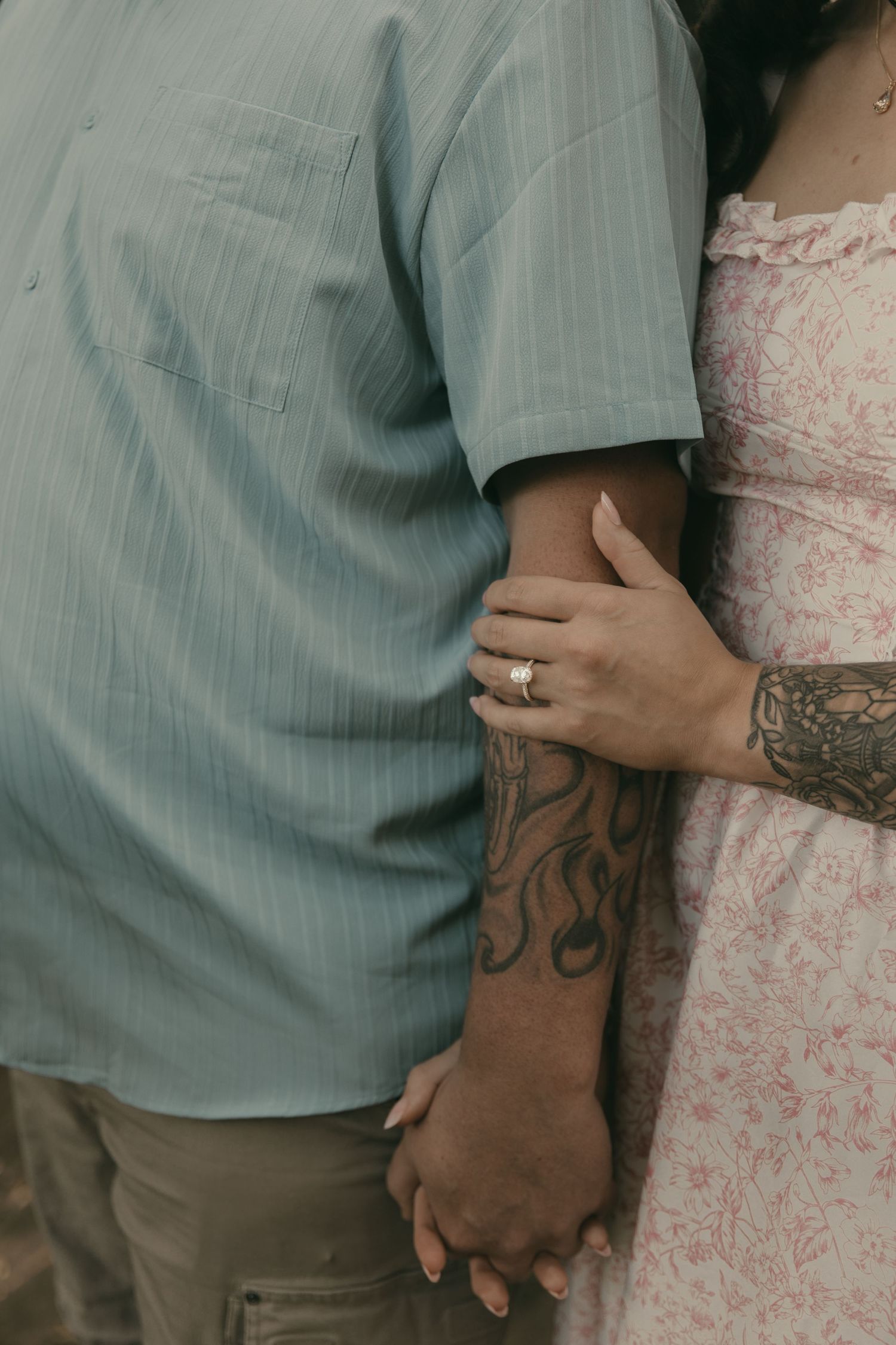 Close up of engagement ring and hands in Lake County Ohio by Gypsy Lens Photography. Moody, filmy, vintage, documentary wedding photography