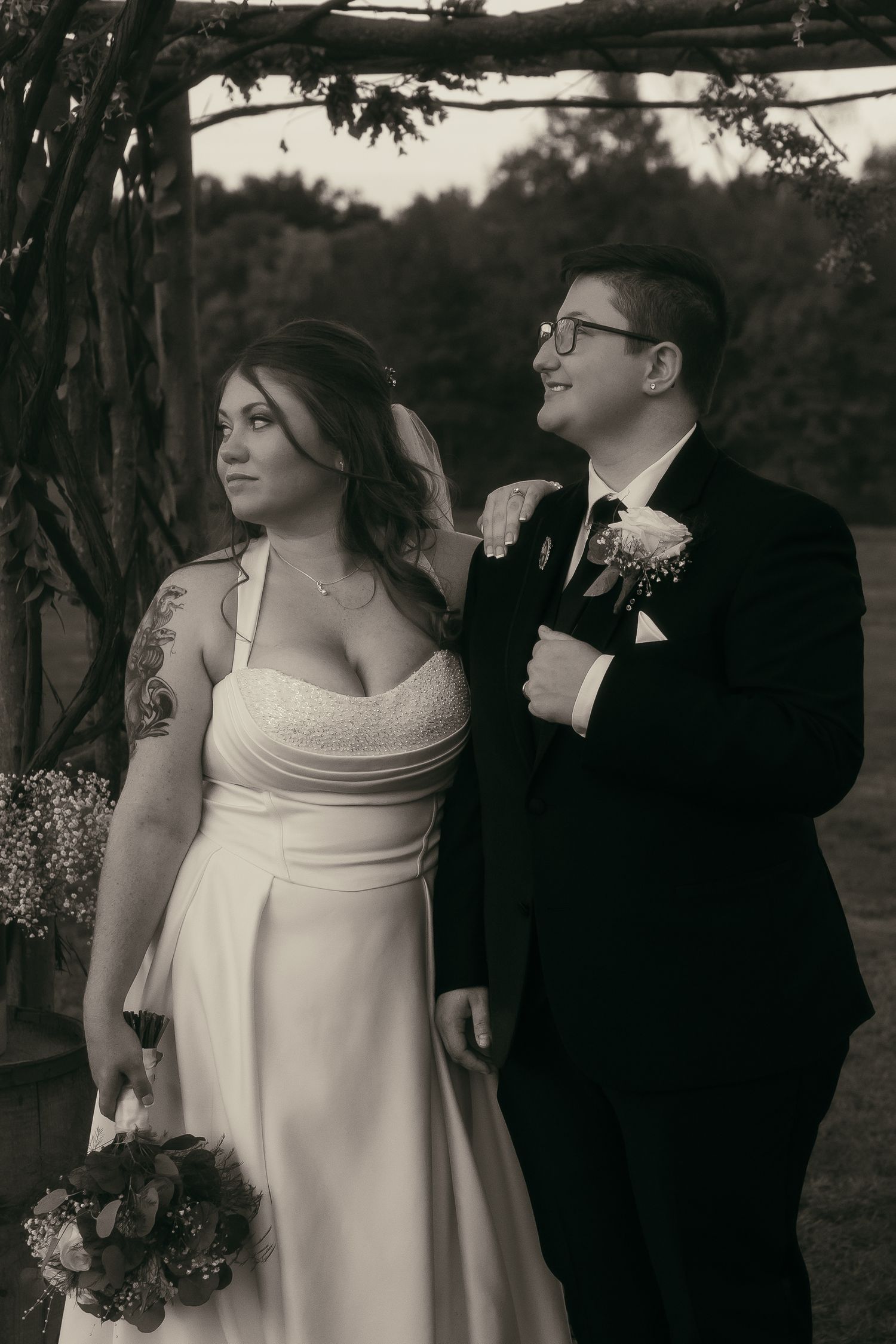 Black and white two brides on wedding day in Cleveland Ohio by Gypsy Lens Photography. Moody, vintage, documentary wedding photography.