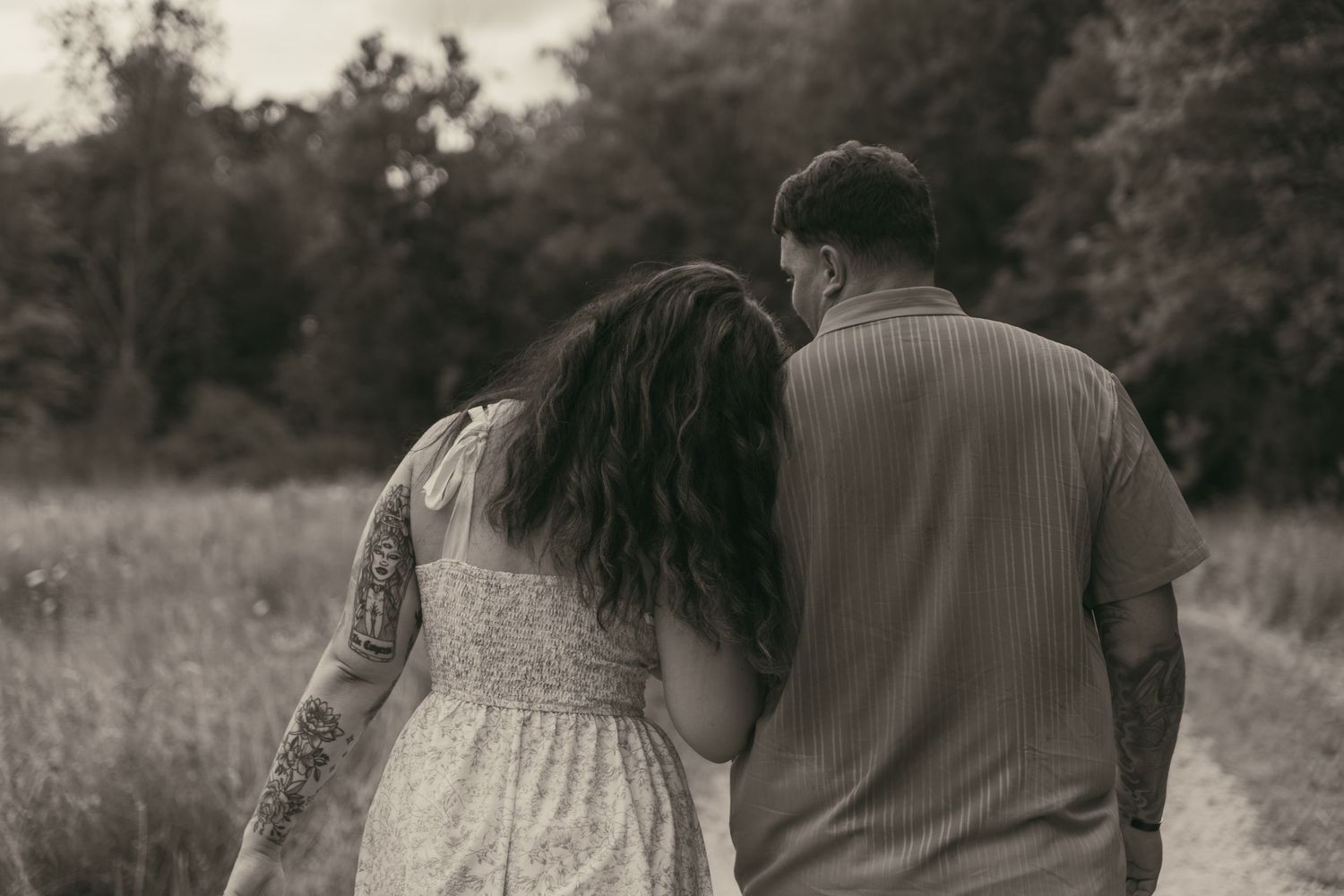 Dreamy portrait in a wildflower meadow in Lake County Ohio by Gypsy Lens Photography. Moody, filmy, vintage, documentary wedding photography