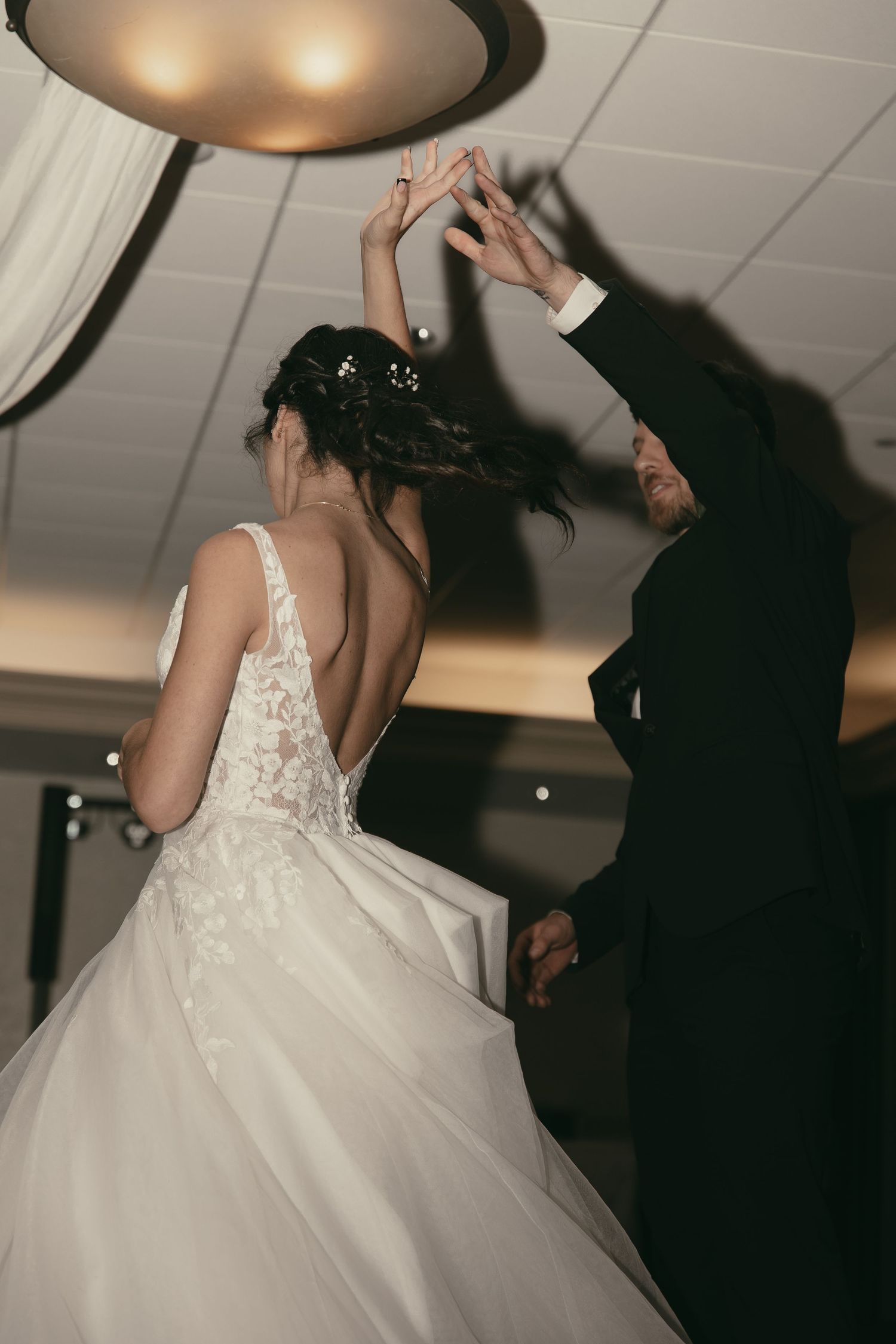 Newlyweds first dance in Tallmadge Ohio by Gypsy Lens Photography. Moody, vintage, nostalgic, documentary wedding.