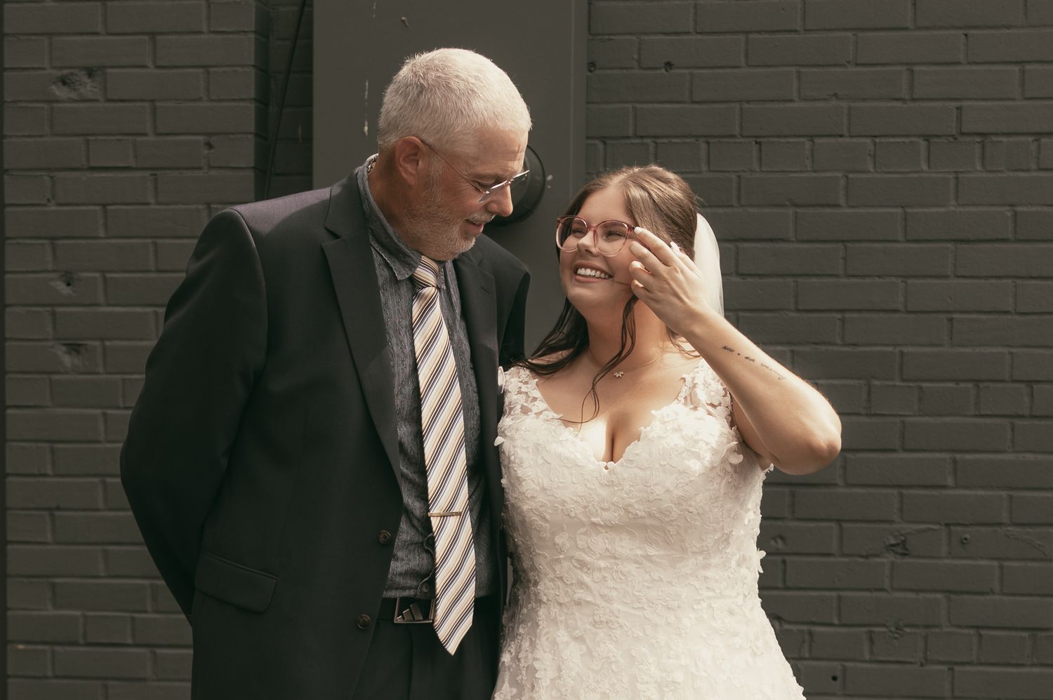 First look with bride and dad in Cleveland Ohio by Gypsy Lens Photography. Moody, vintage, documentary wedding photographer.