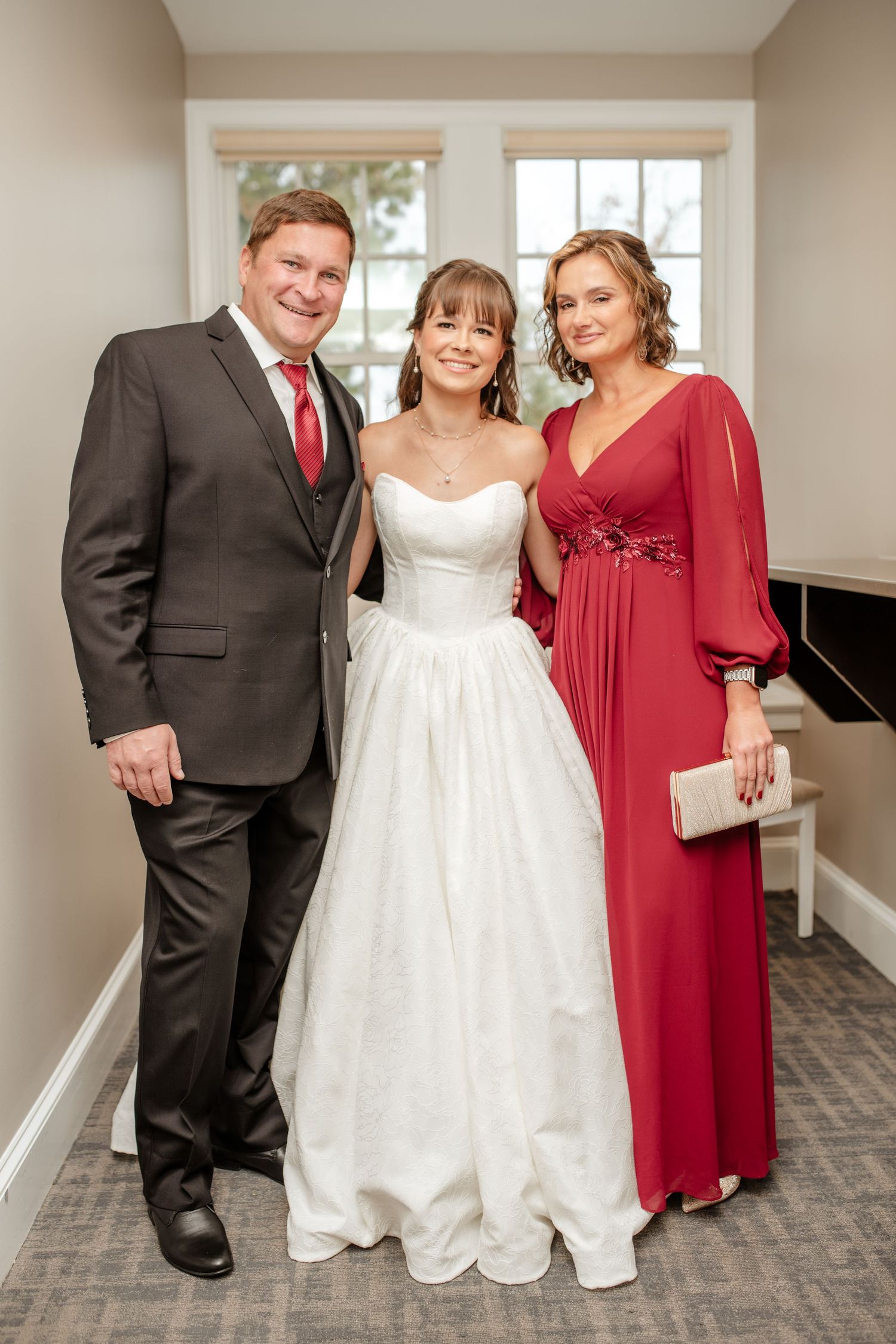Wedding party photos showing family members in formal attire posing with the bride.
