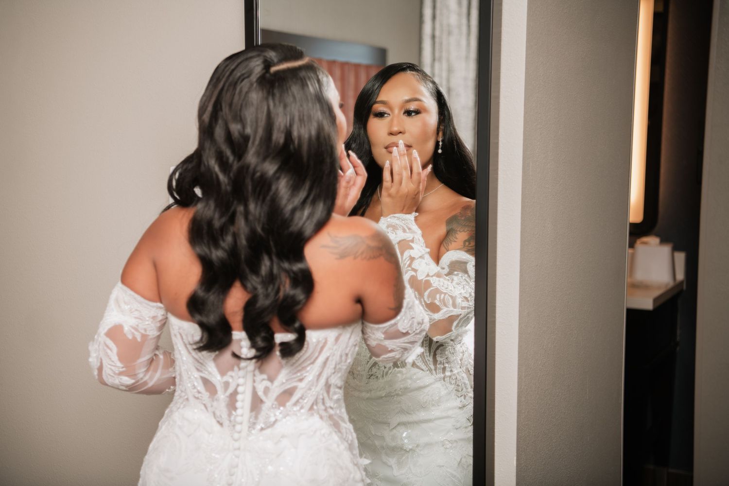 Two people share an emotional embrace during their wedding celebration.