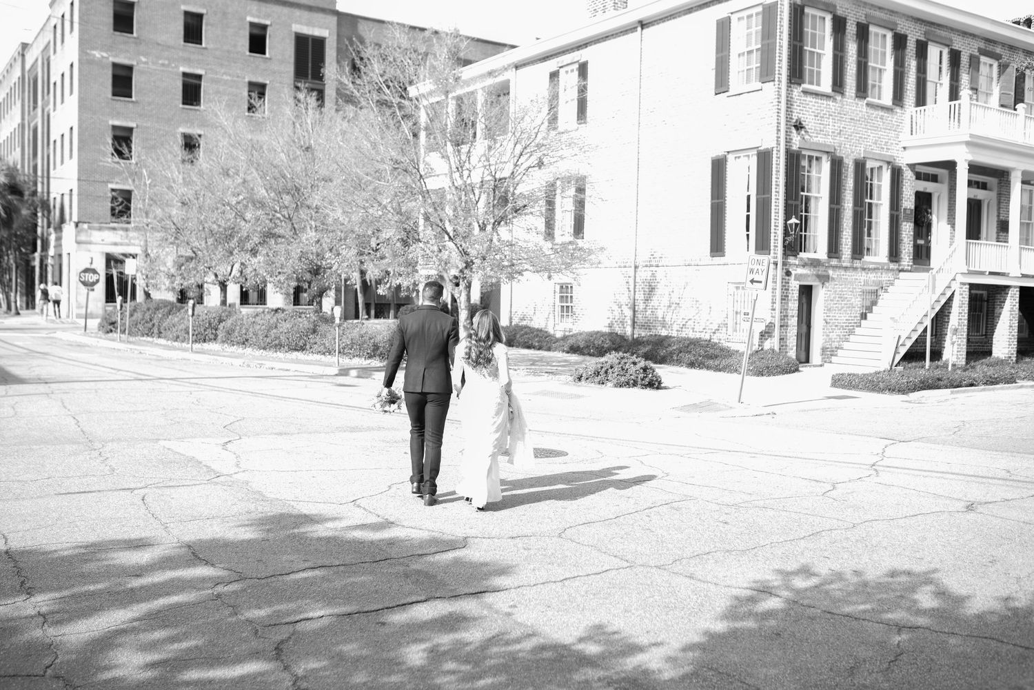 Black and white architectural photos of historic buildings with white columns and brick details.
