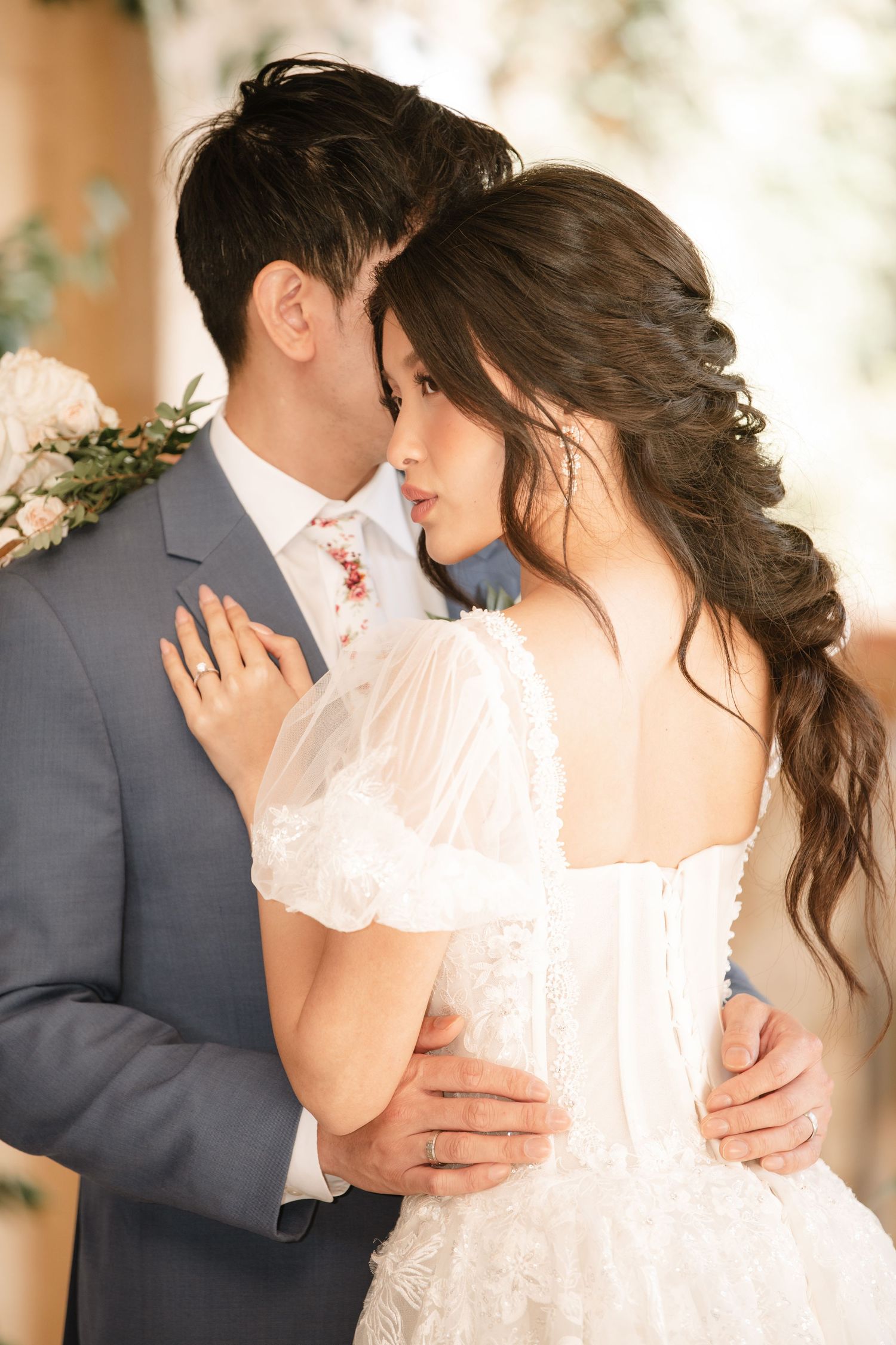 Tender wedding portraits showing romantic embraces in soft natural lighting.