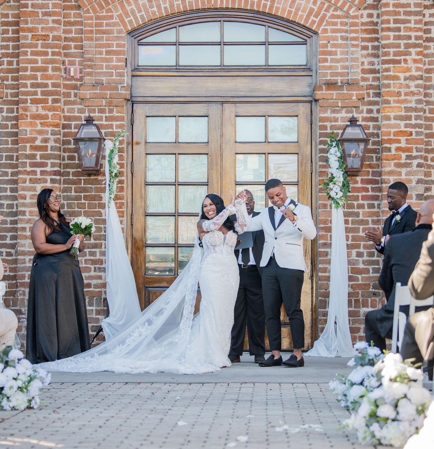 Wedding celebration sequence showing joyful moments outside industrial brick venue.