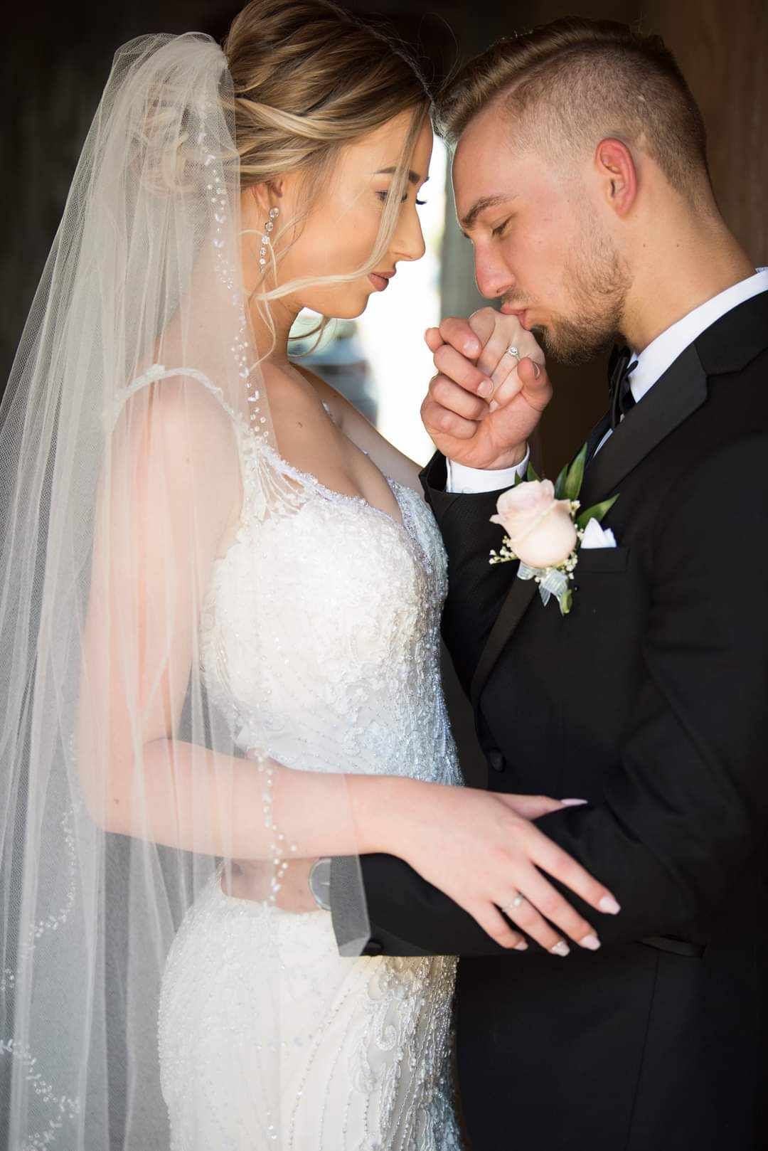 Intimate wedding portrait sequence with delicate veil details in natural light.