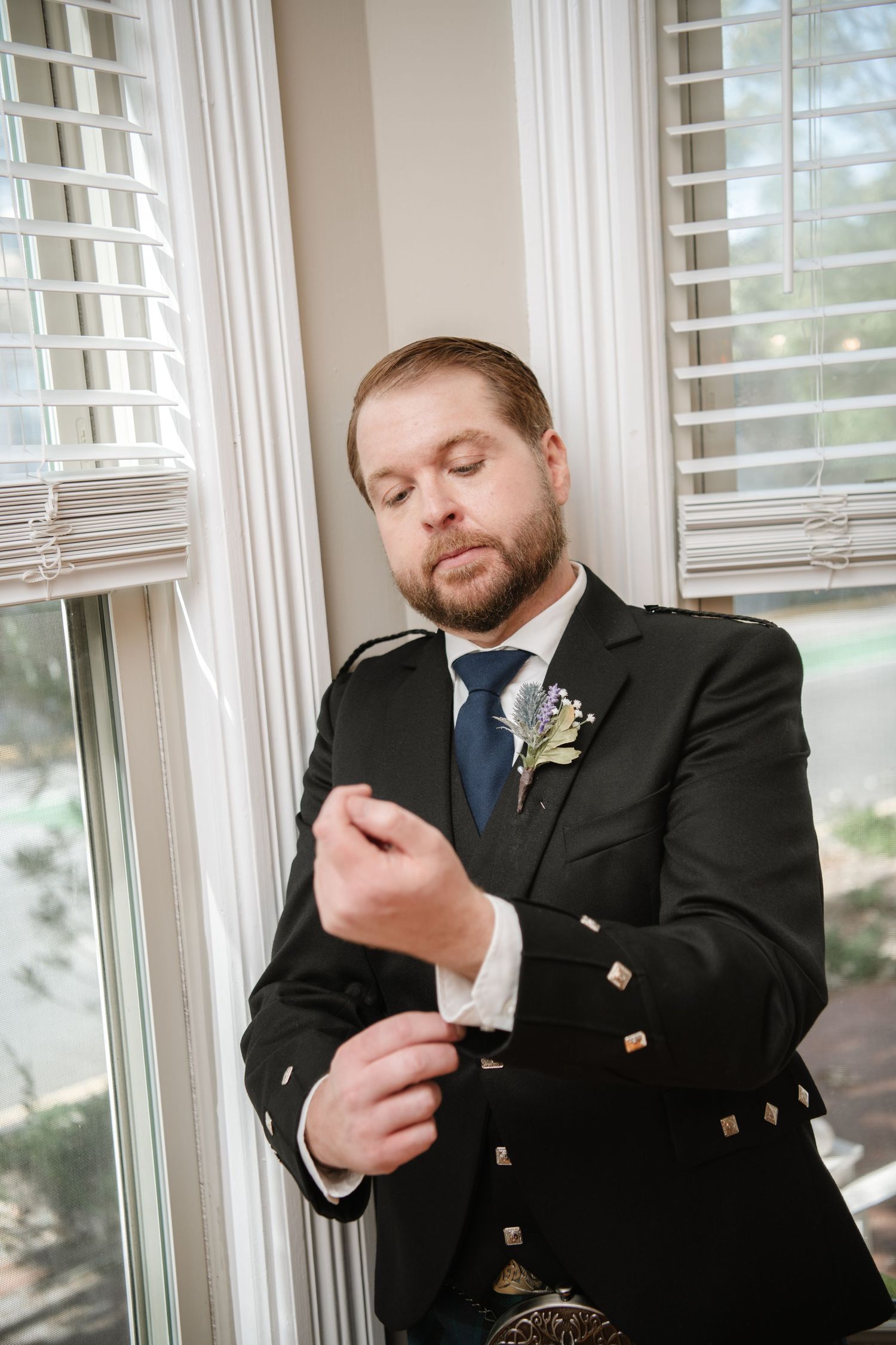 Close-up shots of formal attire details including cufflinks and boutonniere.