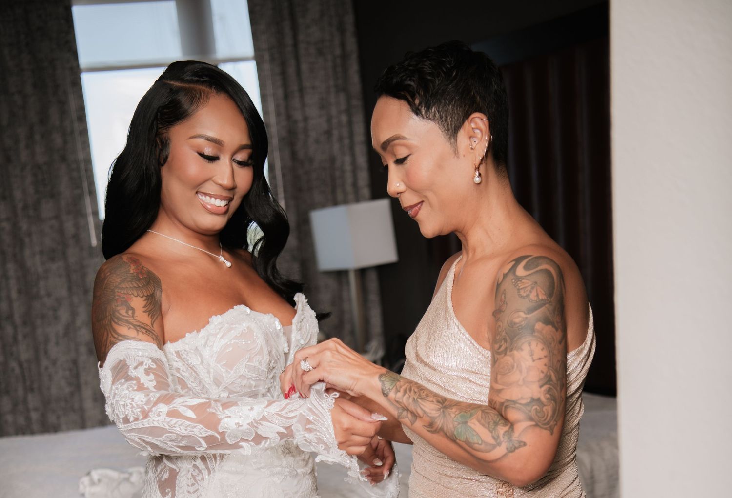 Close-up of two people in formal attire embracing during a special occasion.