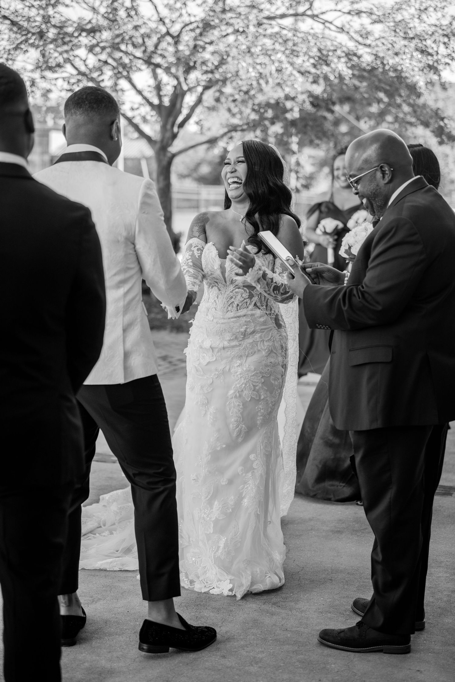 Black and white candid shots of wedding guests and party members during outdoor celebration.