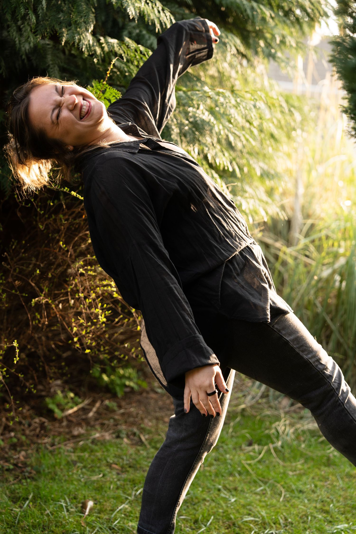 A sequence of playful movements captured against a natural outdoor backdrop with golden light.