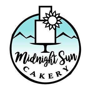A circular logo design for Midnight Sun Cakery featuring mountains, sun, and stylized text in blue and black.