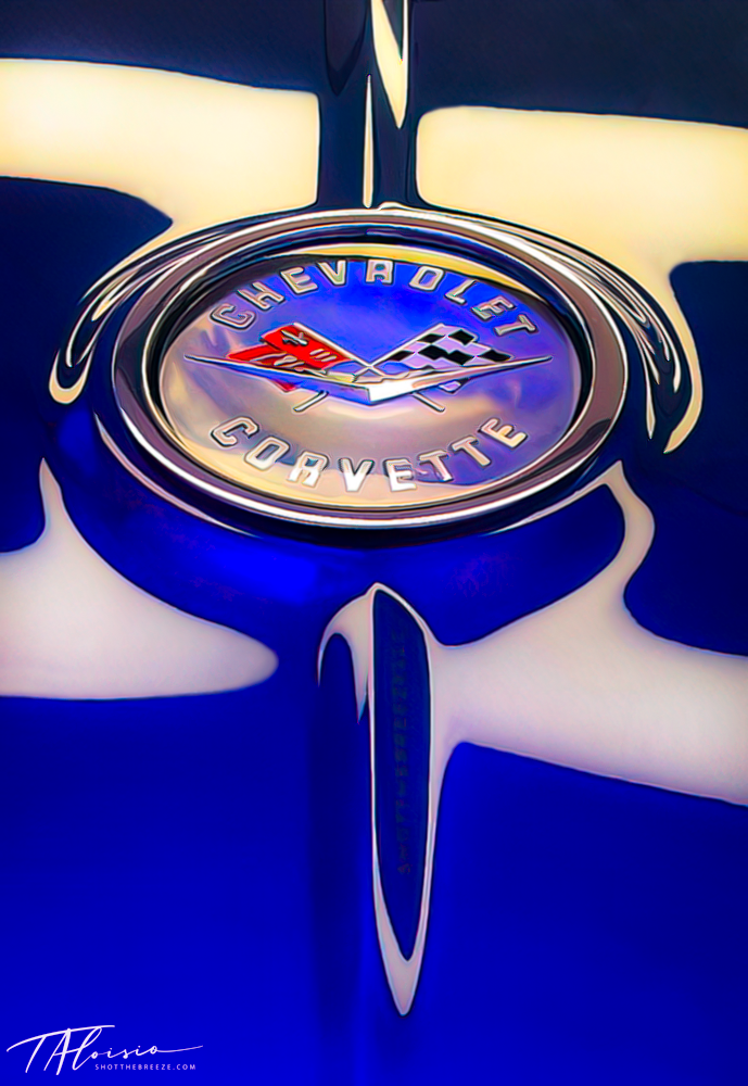 Detail shots of a Chevrolet emblem with dramatic blue and white lighting effects.
