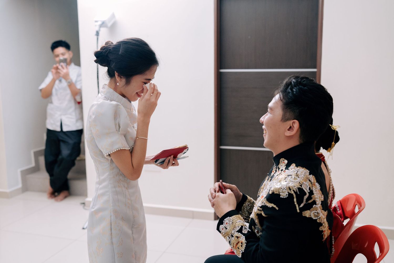 Bride's younger sister shares an emotional moment with the groom during the wedding festivities