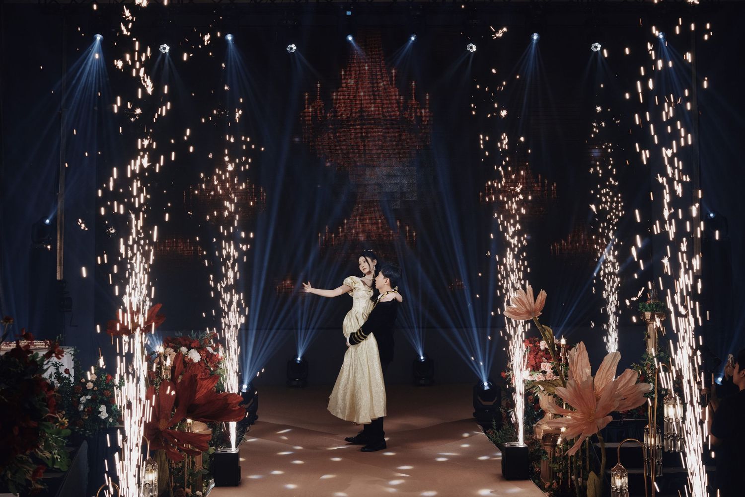 Grand wedding entrance with indoor cold spark pyrotechnics and a romantic ballroom lift
