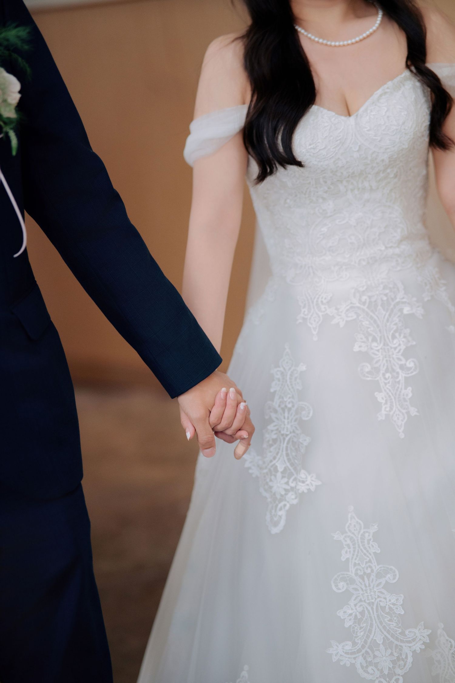 Romantic couple portrait at a Peninsula House Penang wedding showing wedding attire and pearl jewelry details