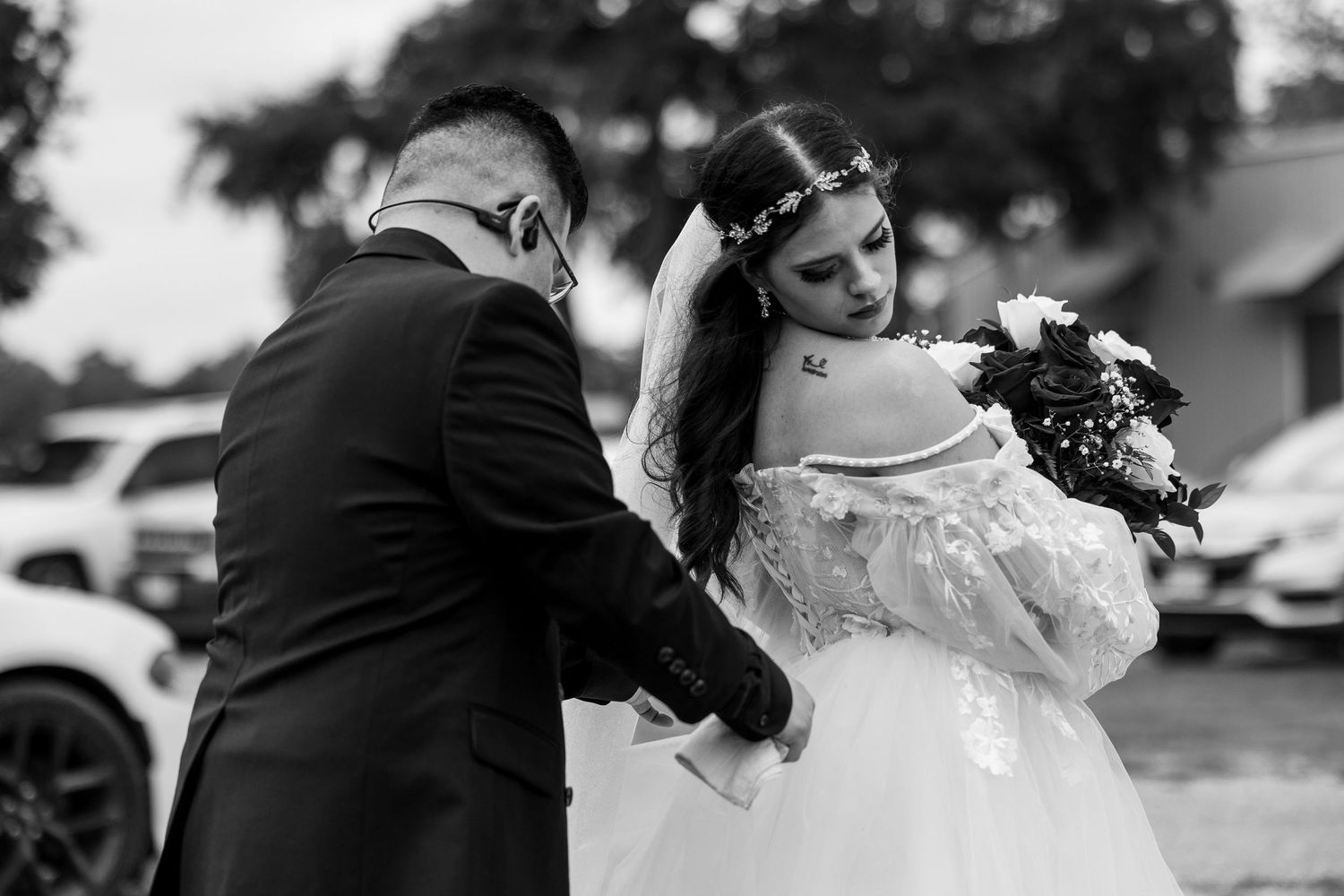 Black and white wedding photography capturing emotional moments during the ceremony.