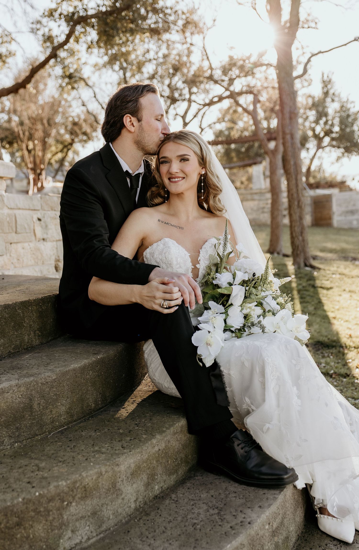 Wedding couple shares romantic moment during couples portraits.