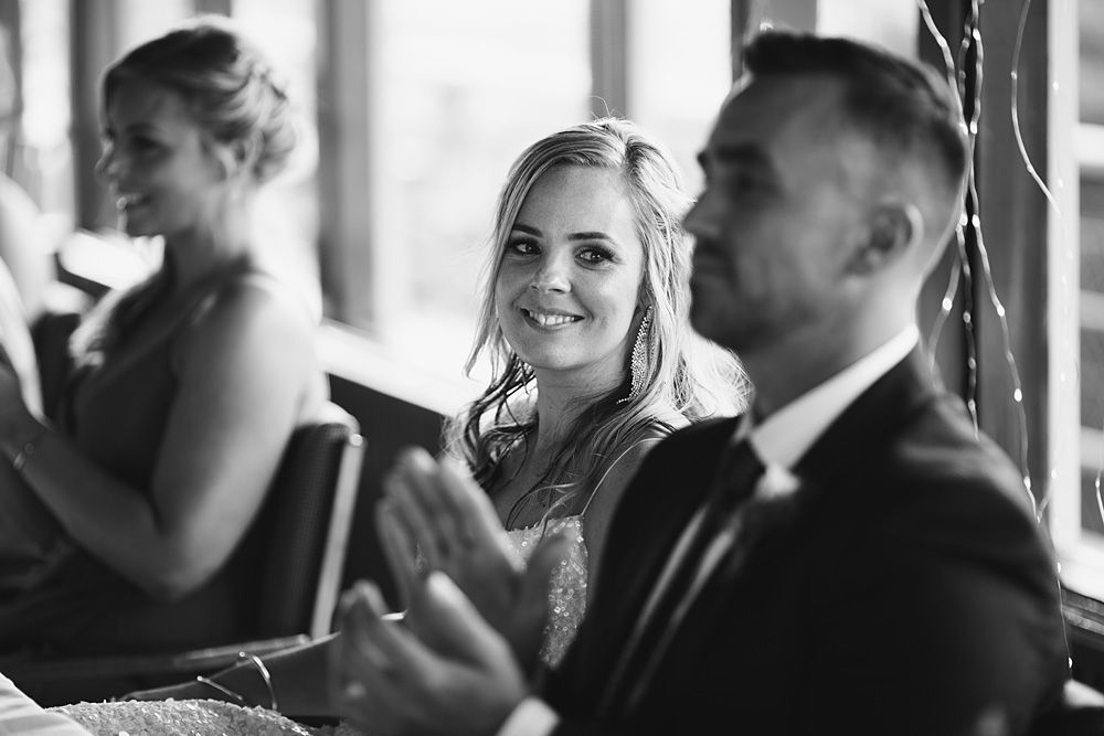 Black and white candid moments captured during an emotional wedding ceremony.