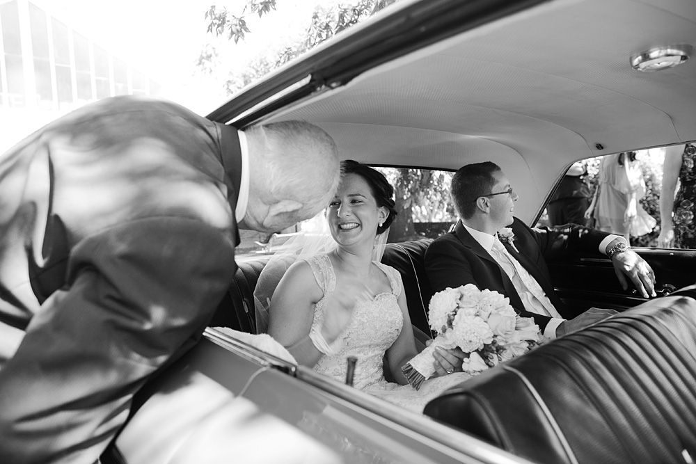 Candid moments captured inside wedding vehicles and cars.