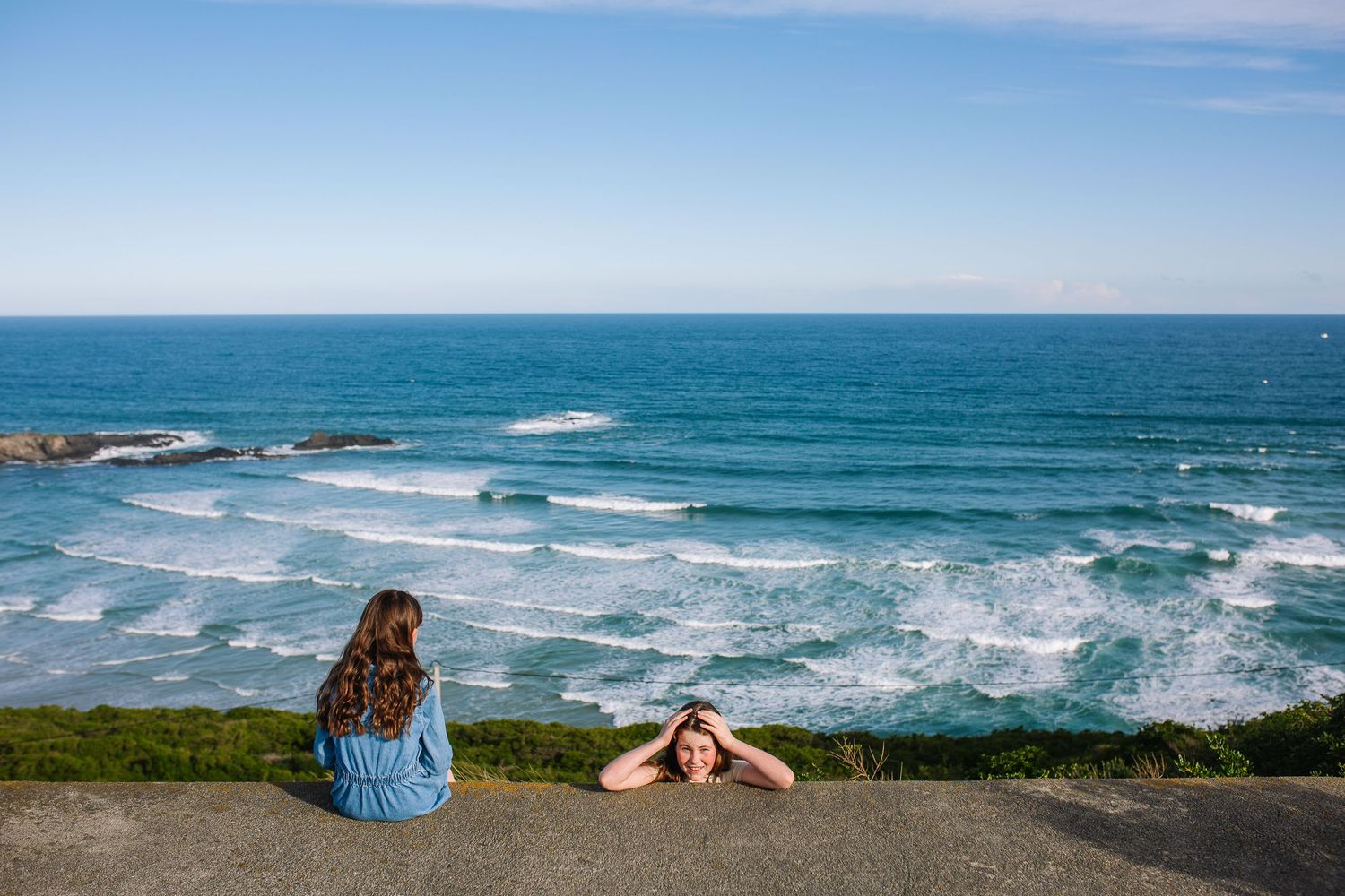 Panoramic collage of coastal scenes showing ocean waves, beach views, and seaside landscapes on a sunny day.