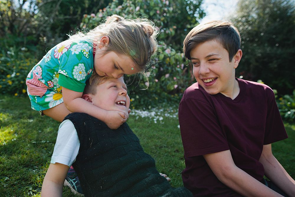 Playful outdoor moments captured in a series of candid interactions.