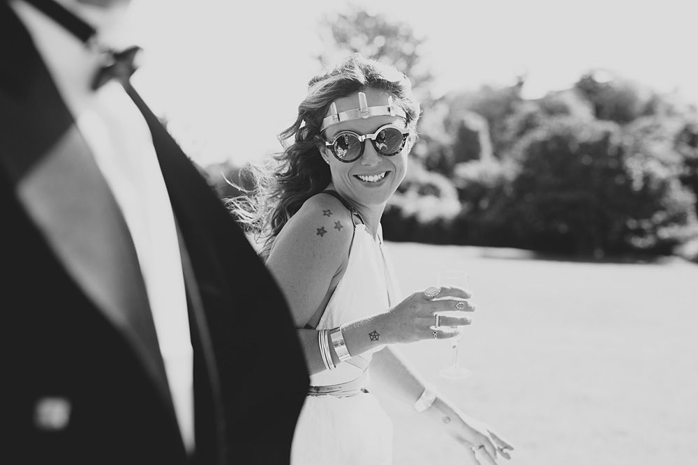 Black and white wedding portraits taken outdoors in natural light.