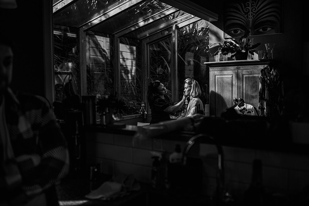 Dark interior architectural shot showing dramatic shadows and lighting patterns.