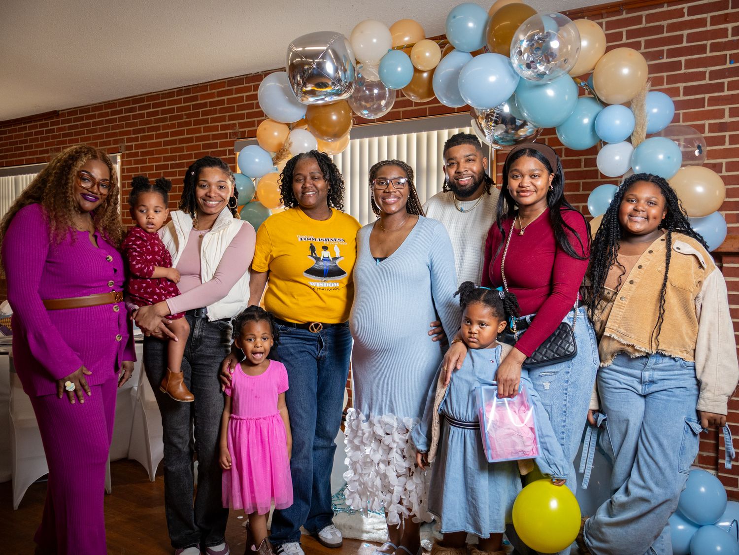 The Parents around their family at their baby shower by Zmoovy Milestones