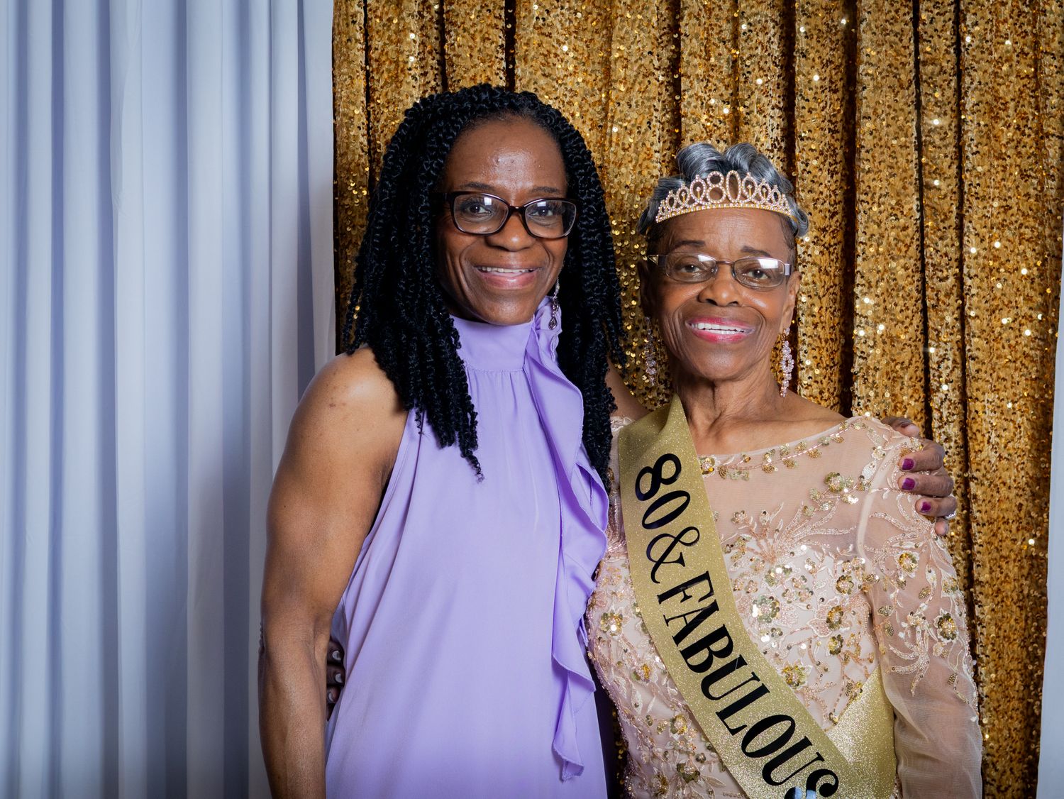 Birthday Girl taking a picture with one of her daughter at her Birthday Party