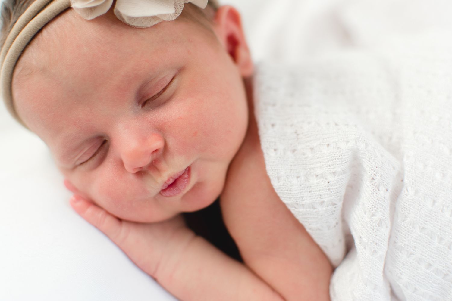 Close up of baby girl taken at a clients home in Saint Clair Shores Michigan
