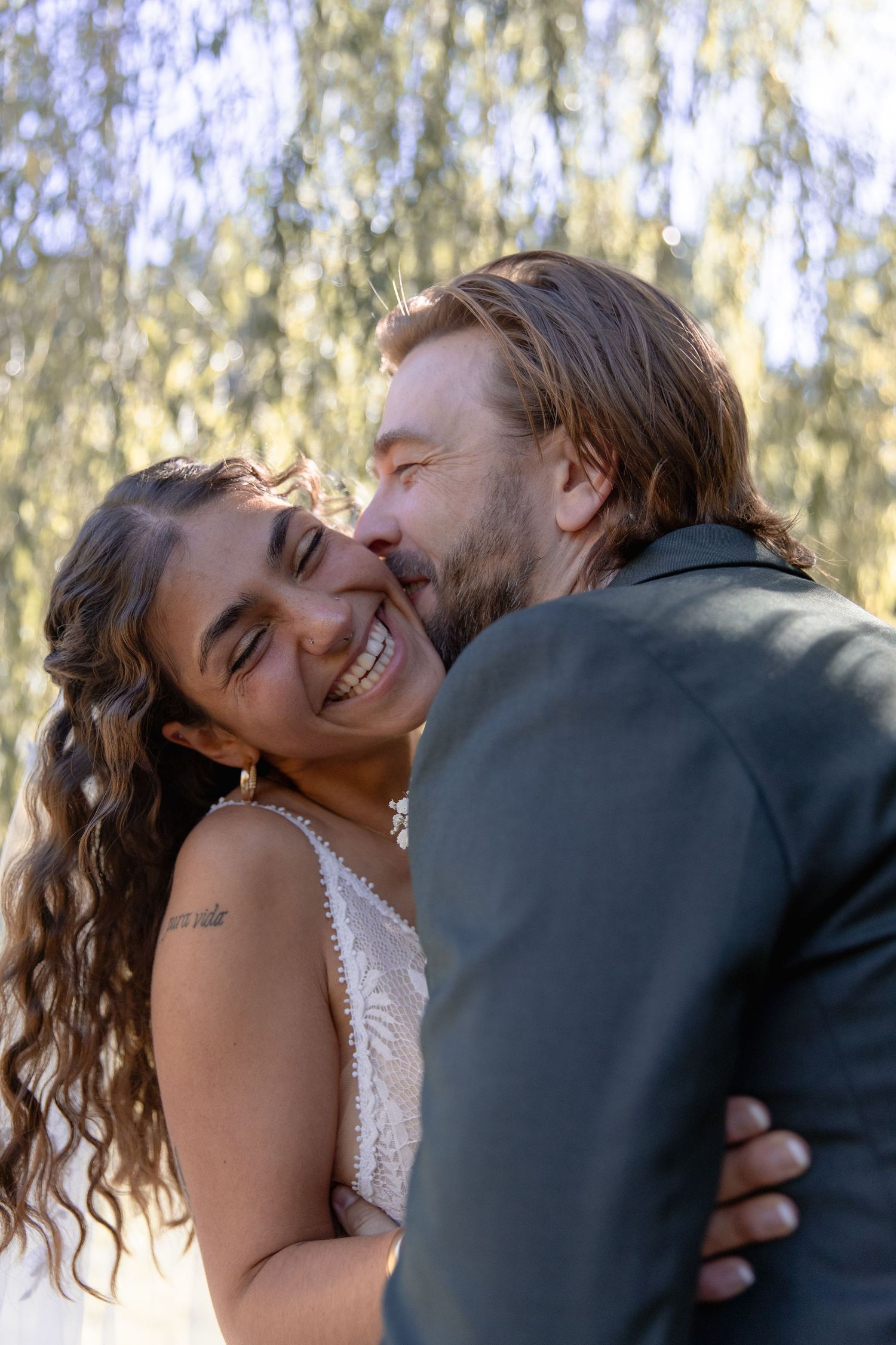 A romantic wedding photo sequence shows a couple sharing an intimate kiss in a sunlit forest setting.