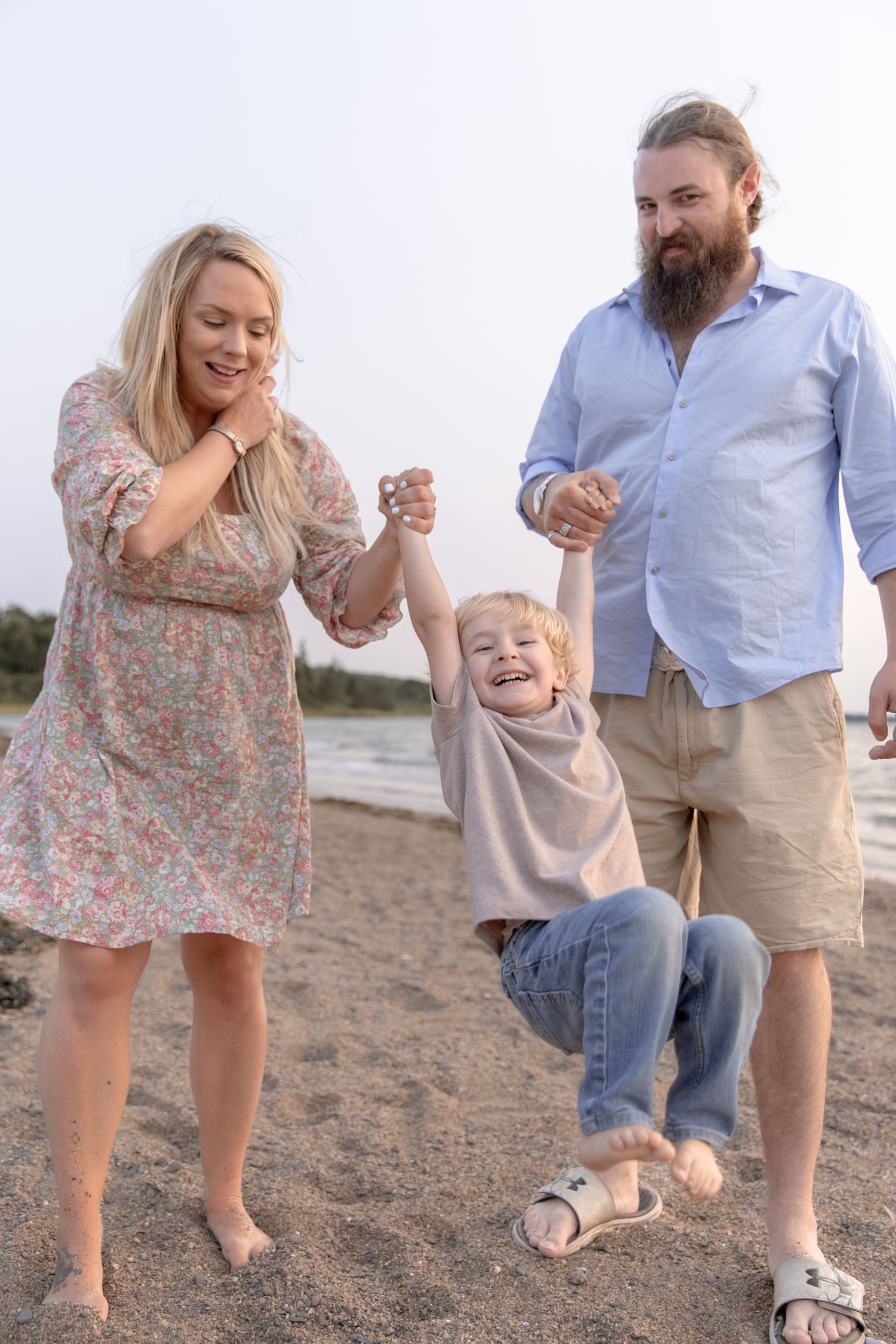 Family walking together on a sandy beach, showcasing joyful interactions and candid moments in a series of photos.