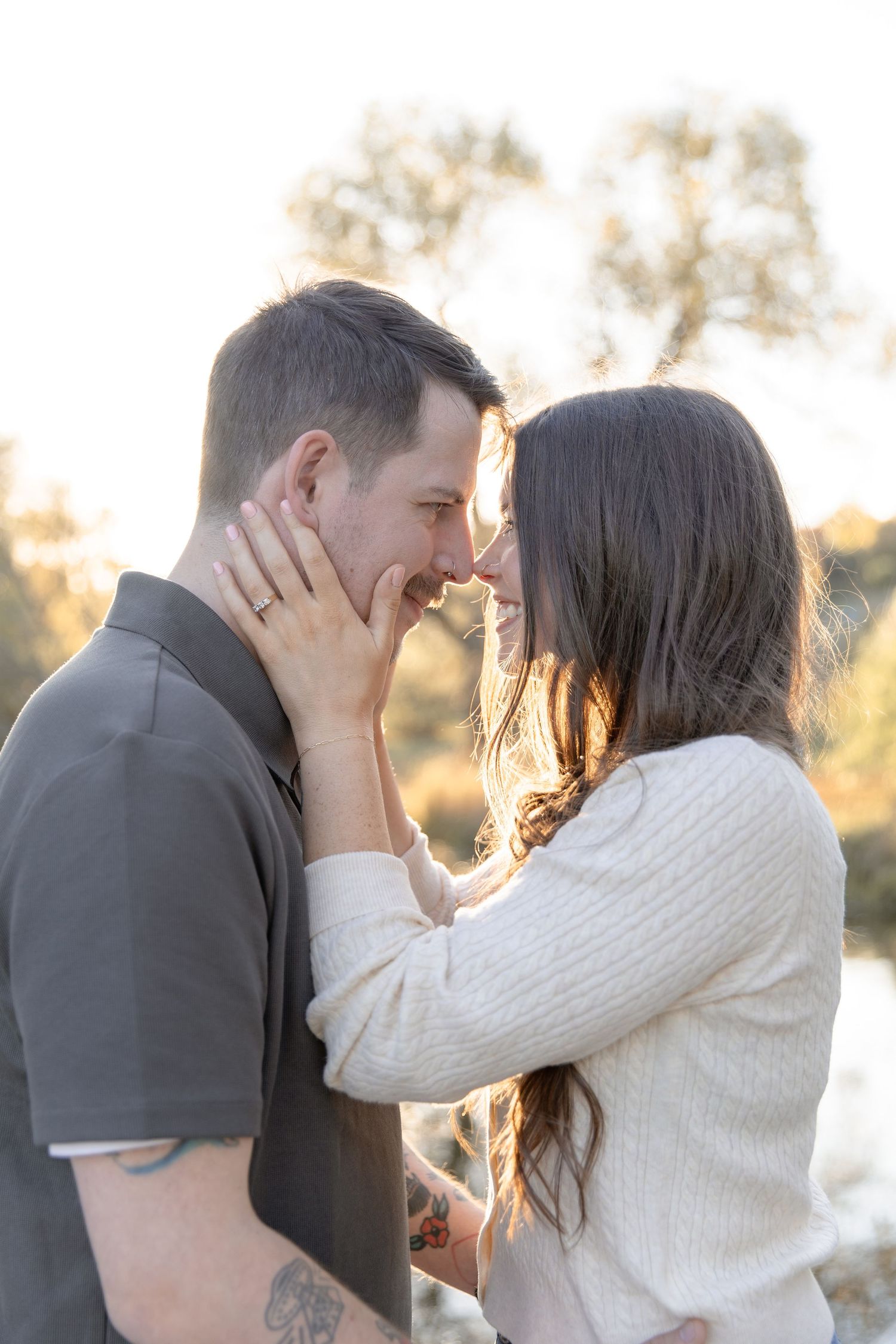 A romantic couple shares intimate moments in a series of outdoor photos during golden hour.
