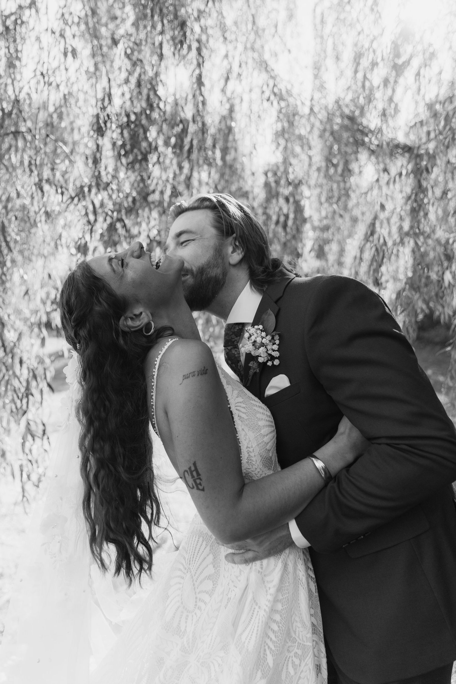 Black and white artistic sequence of a romantic wedding couple dipping pose.