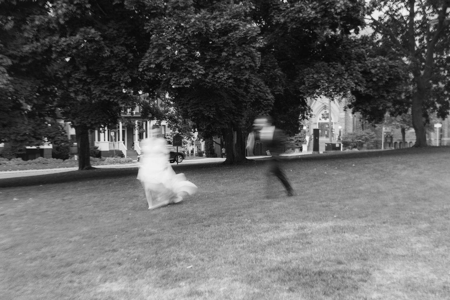 A black and white wedding photo sequence shows a person running playfully across a grassy lawn.