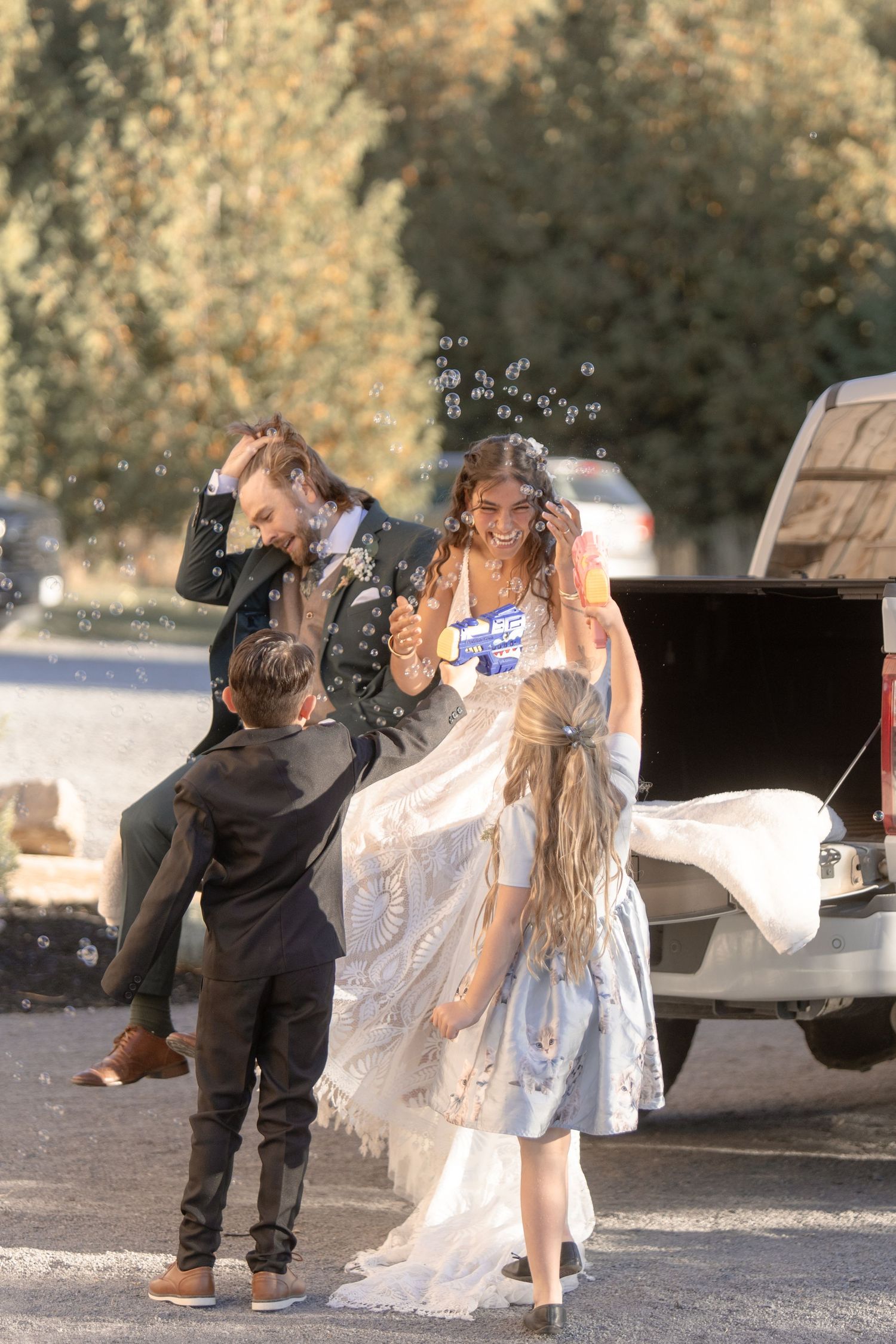 A romantic dance sequence shows a couple twirling and dipping together on a gravel path outdoors.