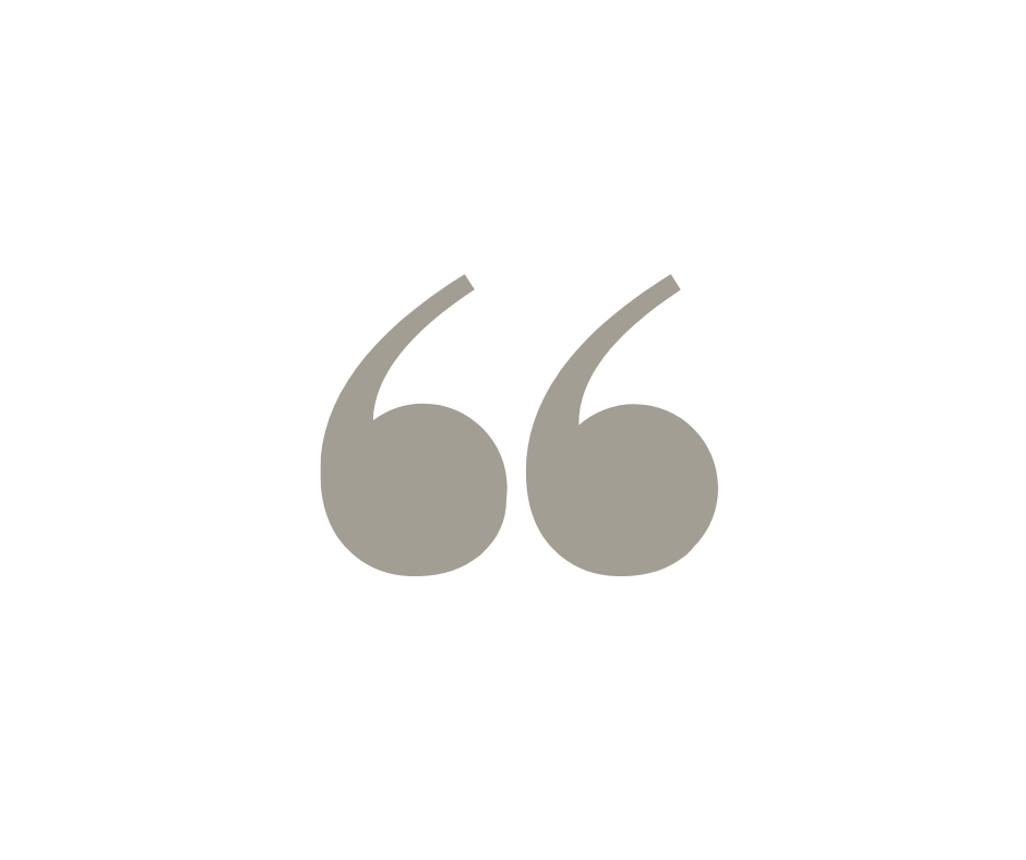 Large gray quotation mark symbol against a white background.