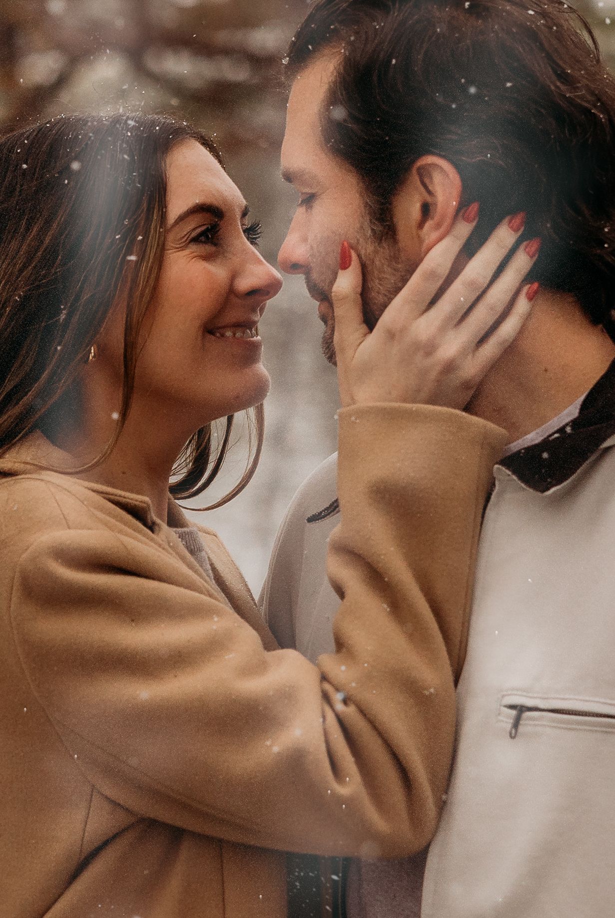 A romantic couple in a camel coat and white sweater share an intimate moment in a series of tender poses.