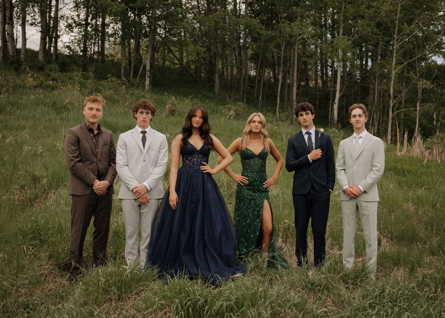 Six grads posing together for senior session photos